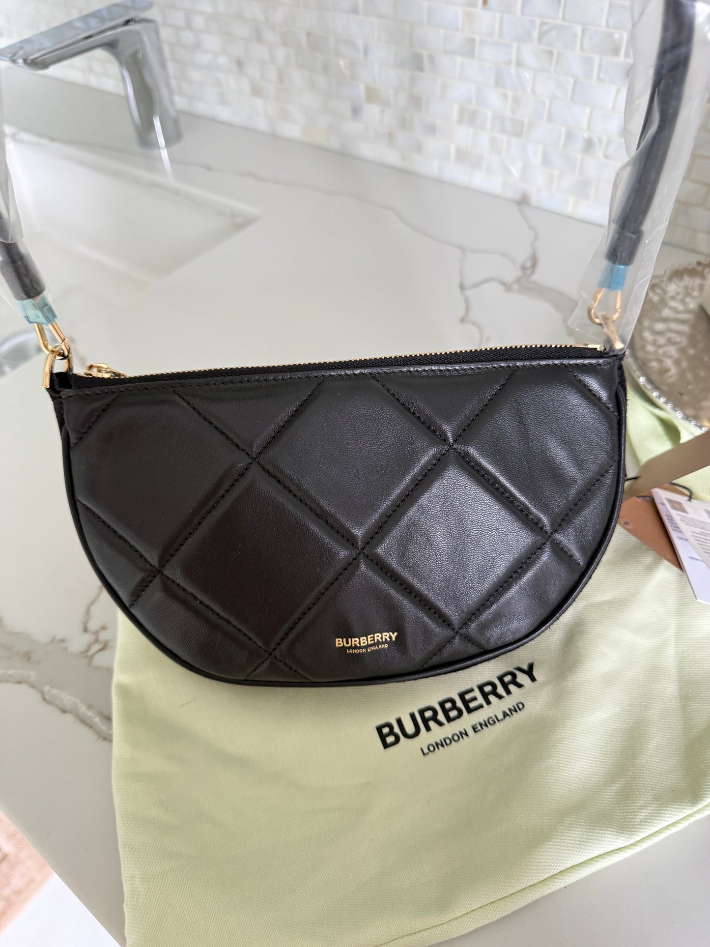 Burberry Olympia padded shoulder bag in Black Leather