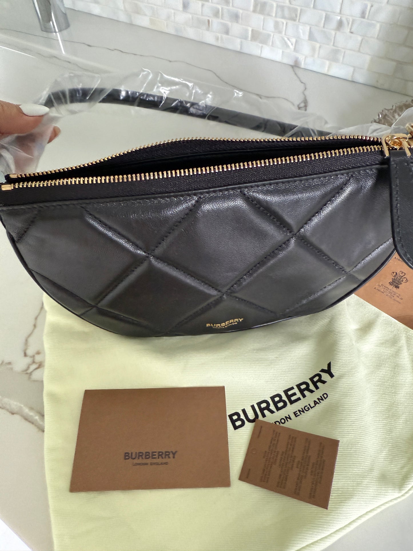 Burberry Olympia padded shoulder bag in Black Leather