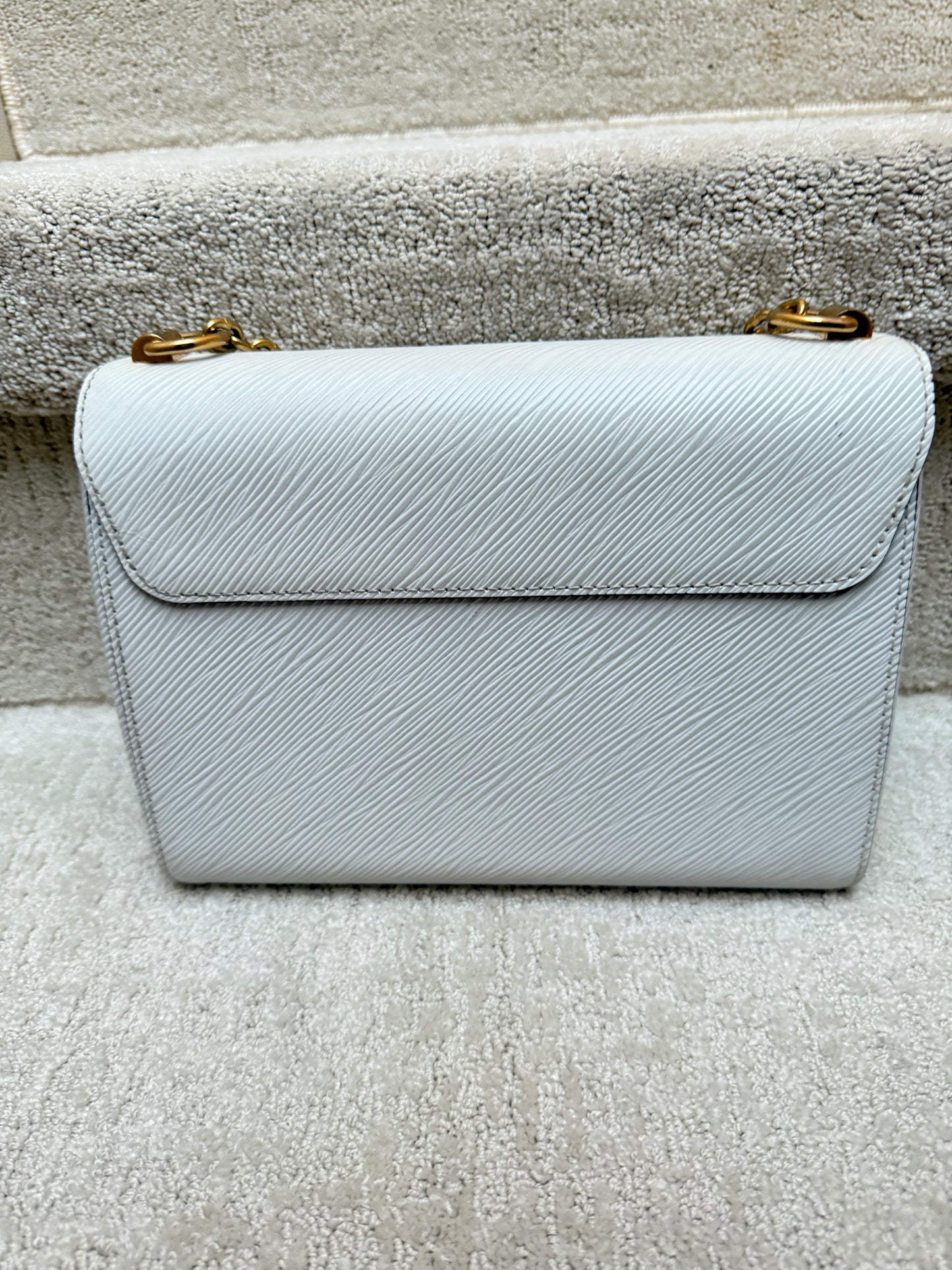 Close up of the rear side of the Louis Vuitton Twist handbag