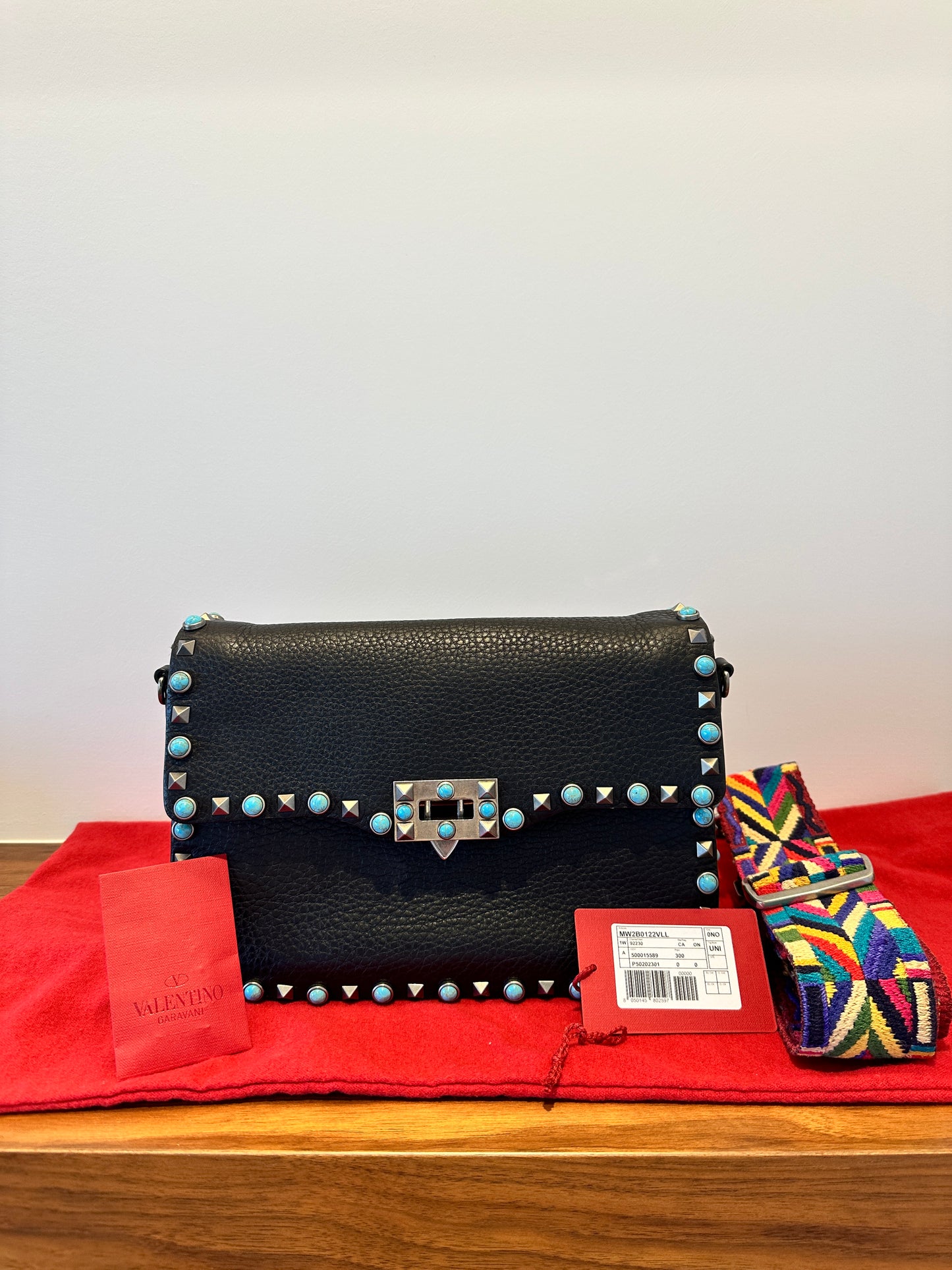 Valentino Calfskin Turquoise guitar strap Rockstud Rolling Flap Bag in Medium