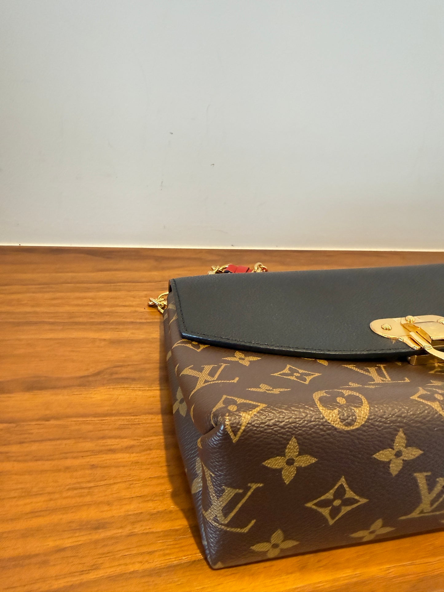 Close up of the front left corner of a louis vuitton saint placide