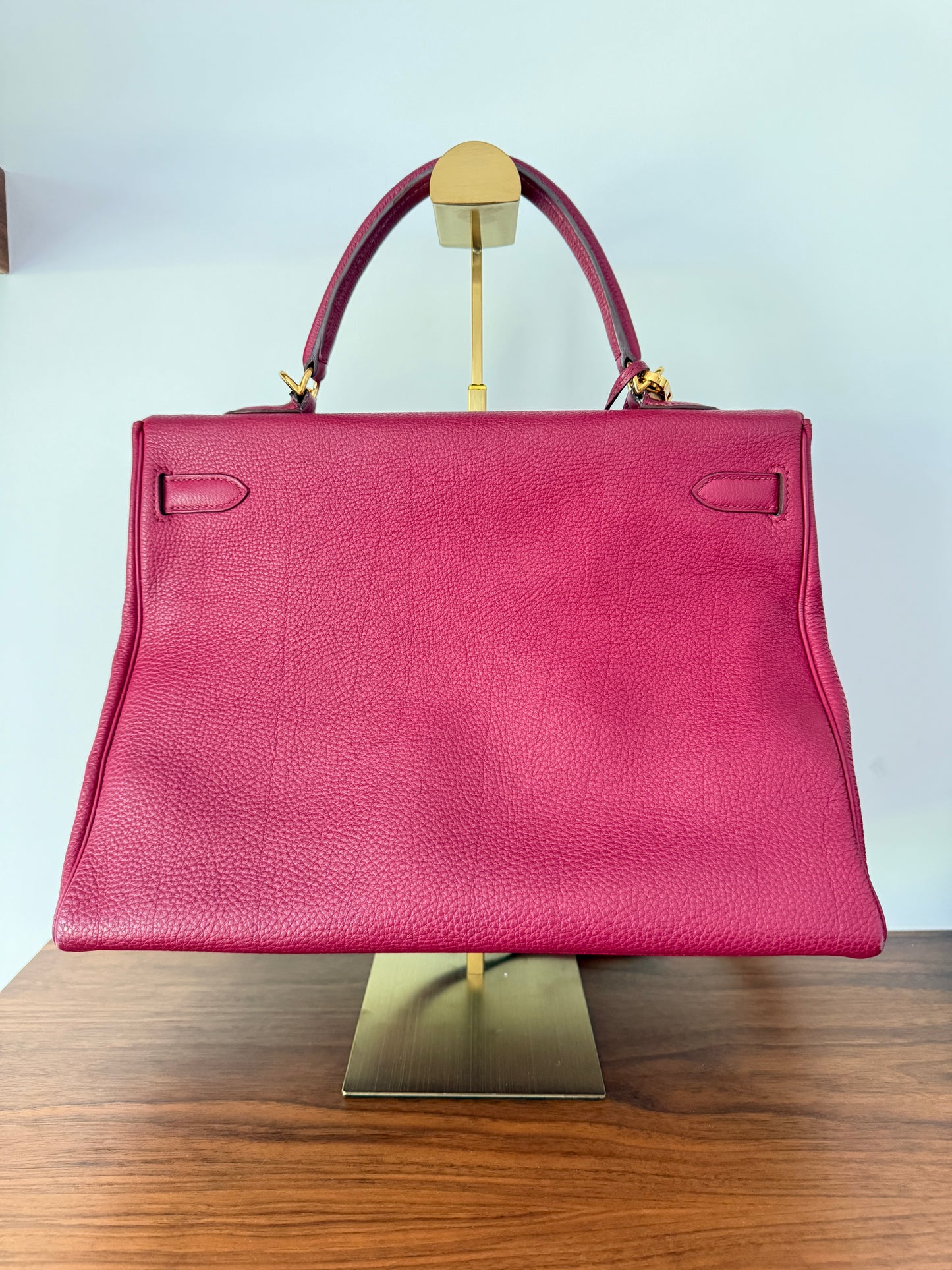 Hermes’ Kelly 35 Retourne Handbag in Togo Leather in Tosca Raspberry Pre-Owned