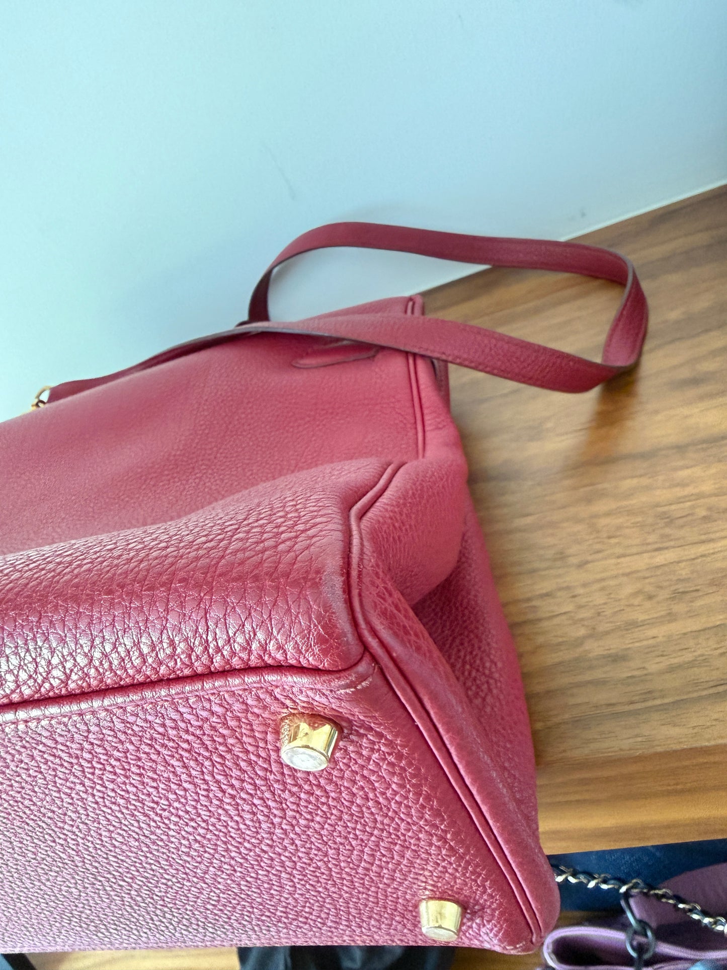 Hermes’ Kelly 35 Retourne Handbag in Togo Leather in Tosca Raspberry Pre-Owned