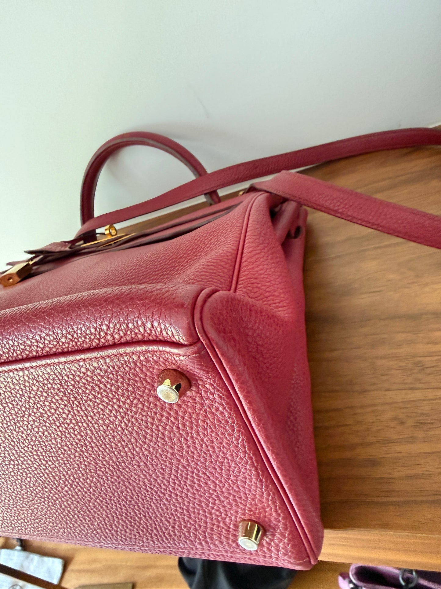 Hermes’ Kelly 35 Retourne Handbag in Togo Leather in Tosca Raspberry Pre-Owned