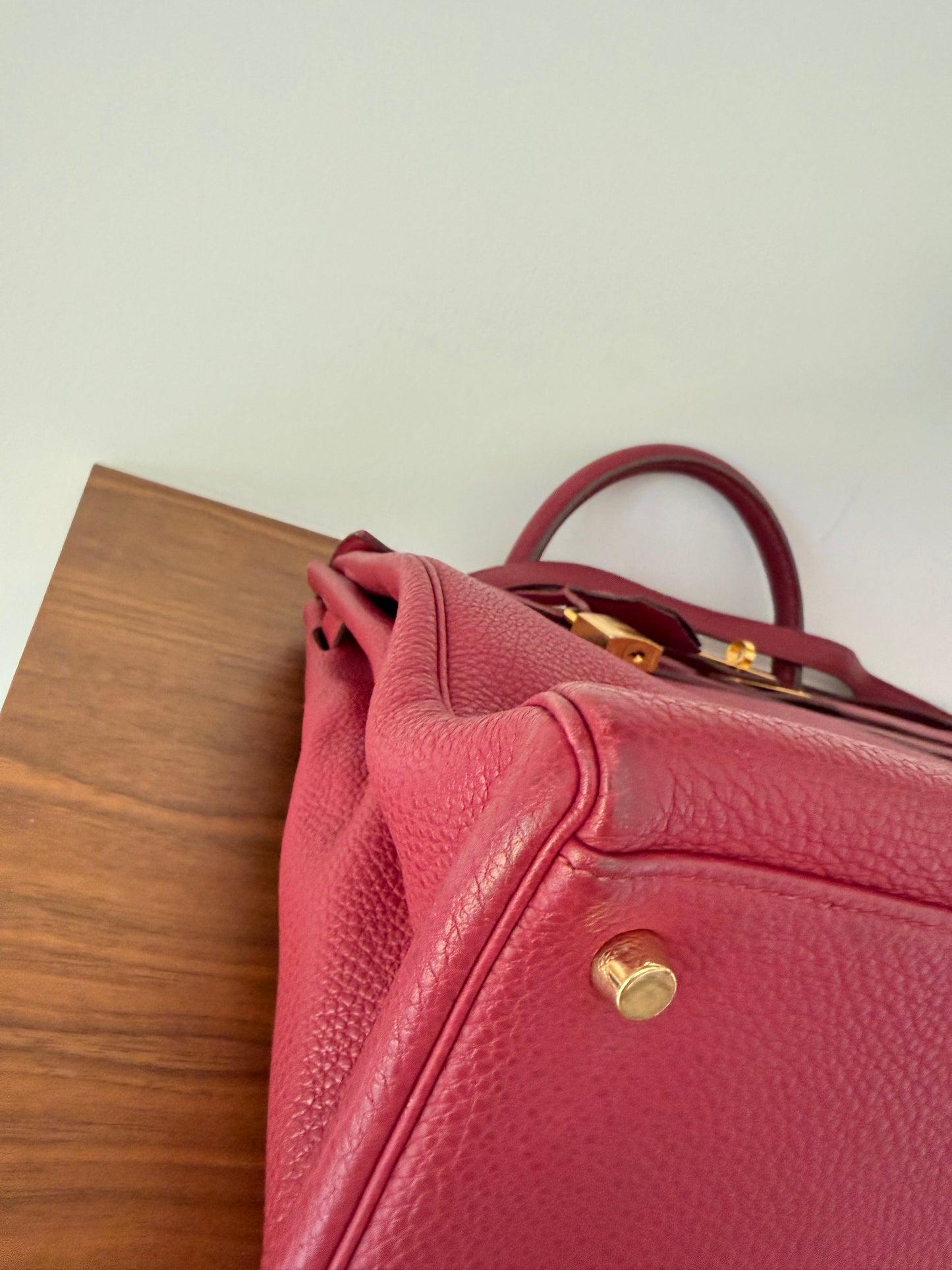 Hermes’ Kelly 35 Retourne Handbag in Togo Leather in Tosca Raspberry Pre-Owned