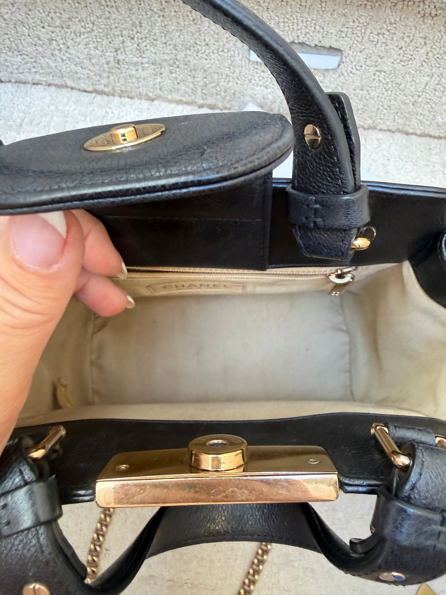 Chanel black label click bag preloved shown a closeup of clean interior