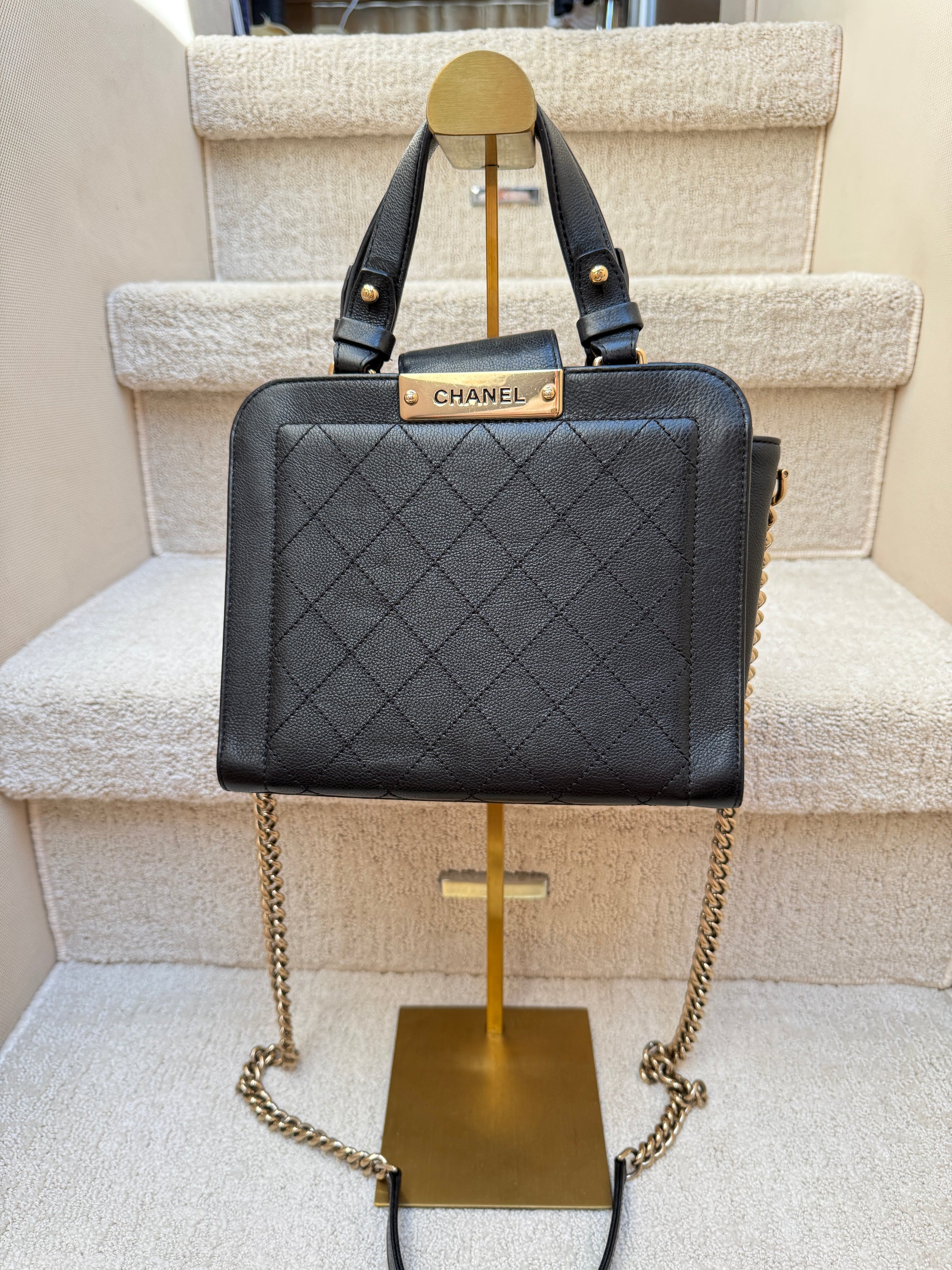 Chanel small click label tote in black and gold authentic and preowned offered for sale from Purseonalshopper 