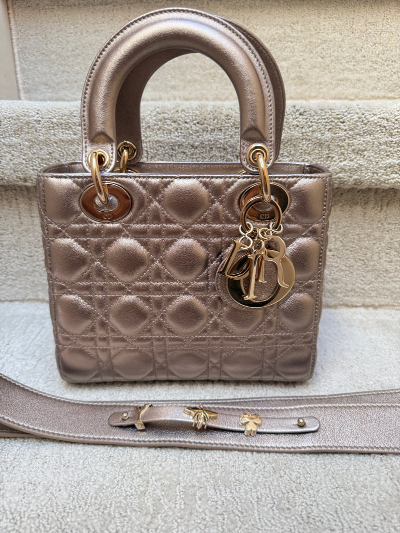 Christian Dior Lady Dior in size small in metallic pink lamsbkin leather with gold hardware authentic and preowned from purseonalshopper