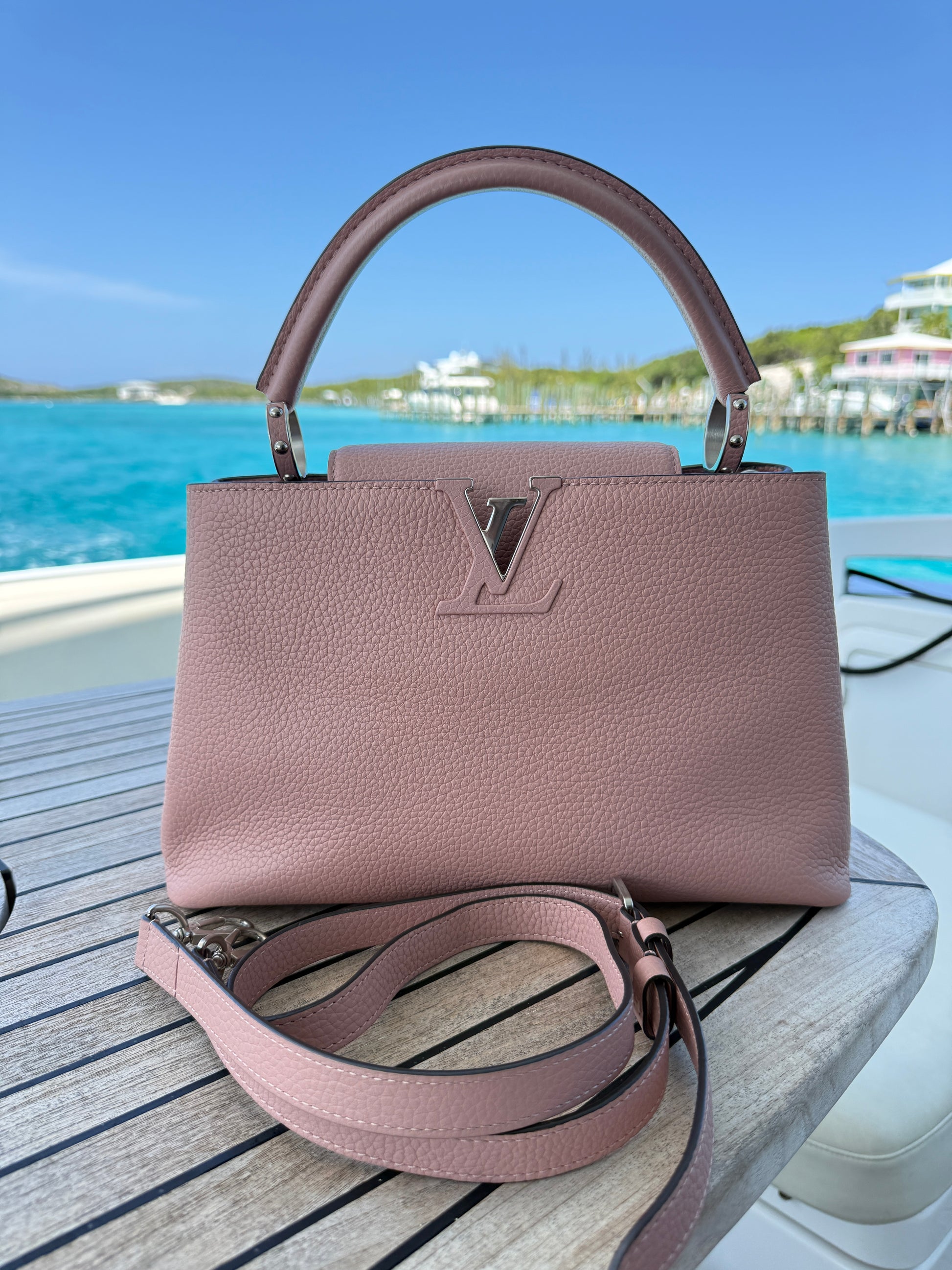 louis vuitton capucines pm in dusty pink with optional shoulder strap full view outside