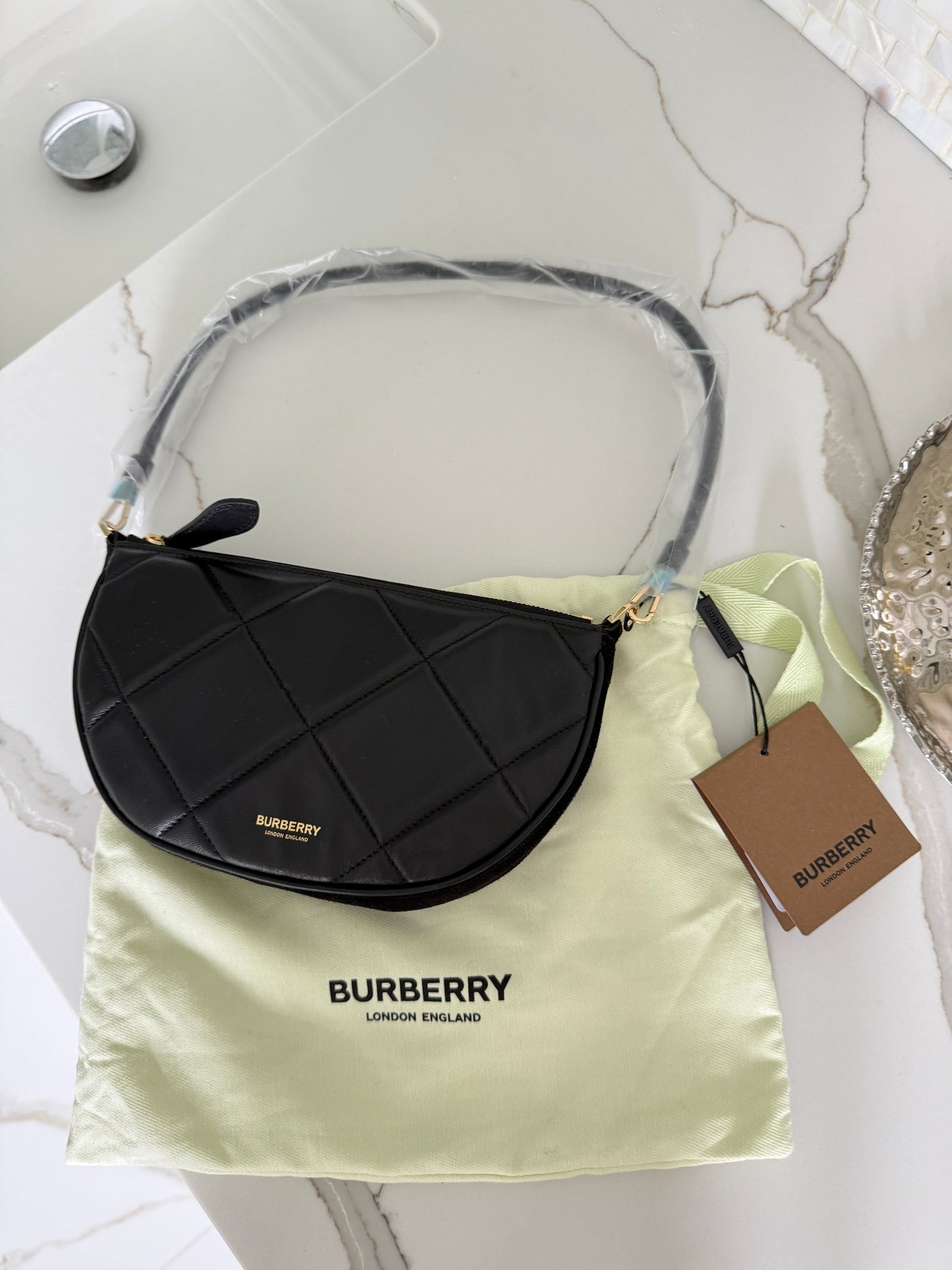 Burberry Olympia padded shoulder bag in Black Leather