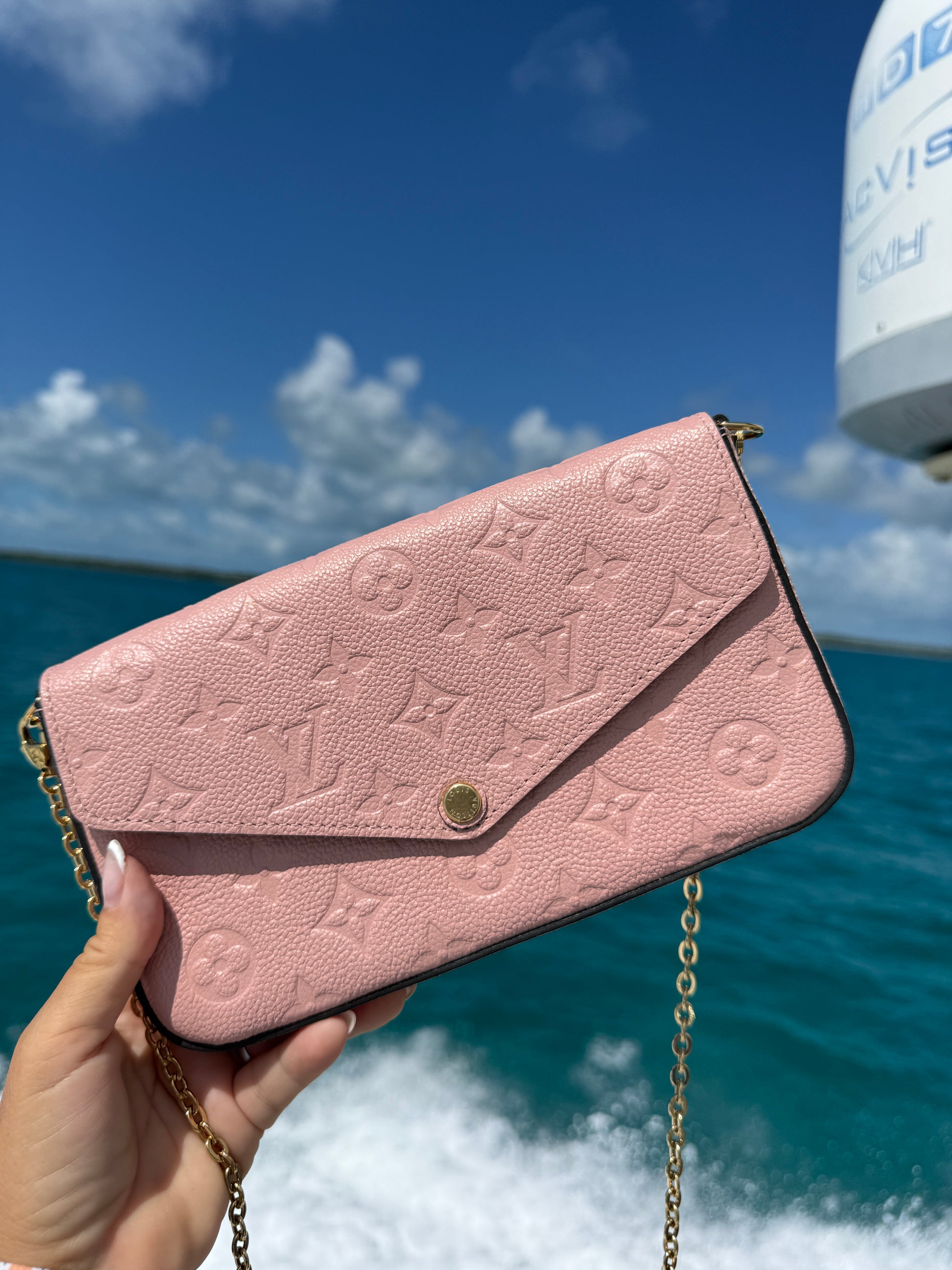 Louis Vuitton felicie pochette in pink empreiente embossed leather authentic pre-owned from purseonalshopper