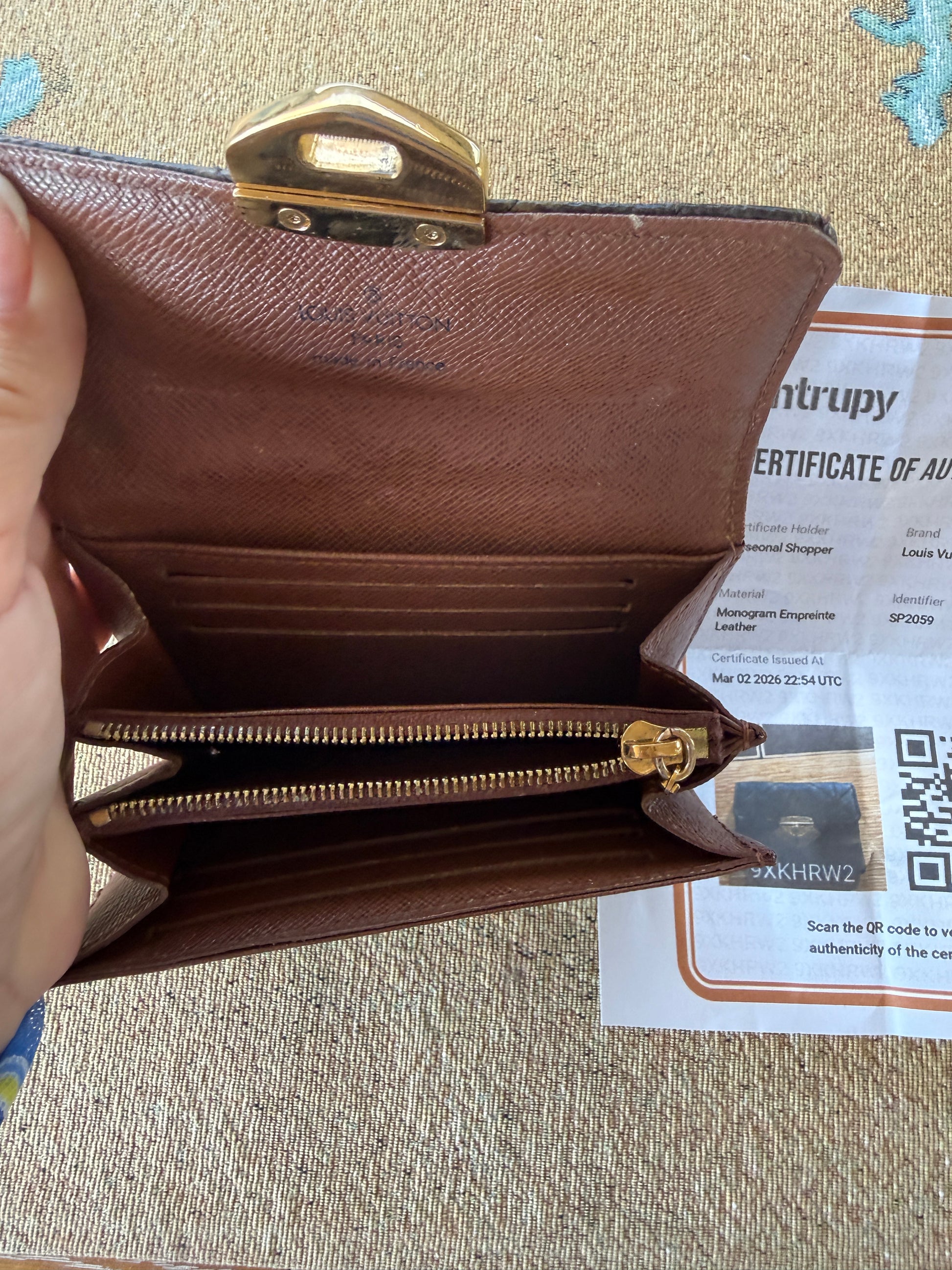 Louis Vuitton Compact wallet in monogram interior view