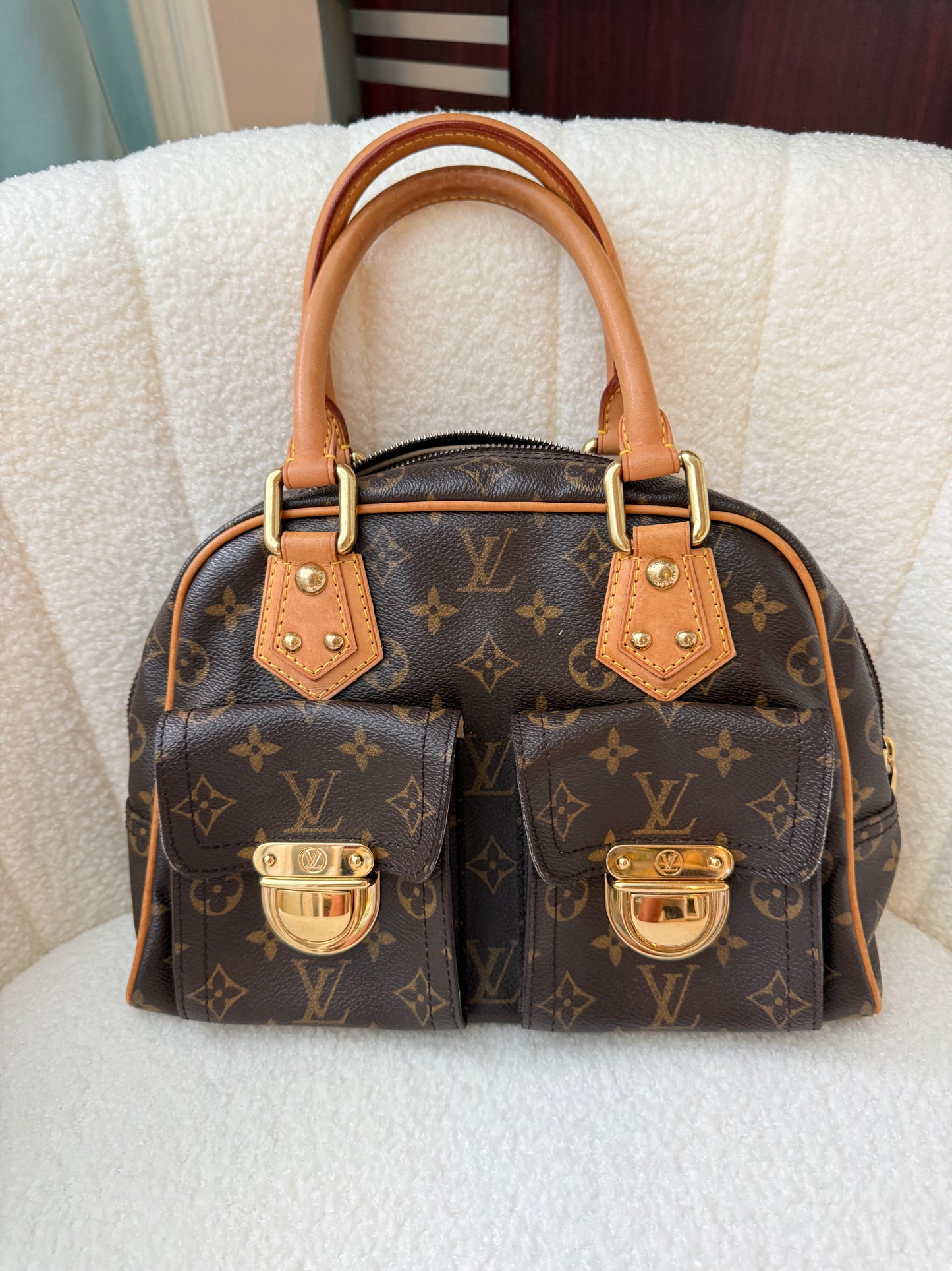 Sac à main Louis Vuitton Manhattan Monogram d'occasion