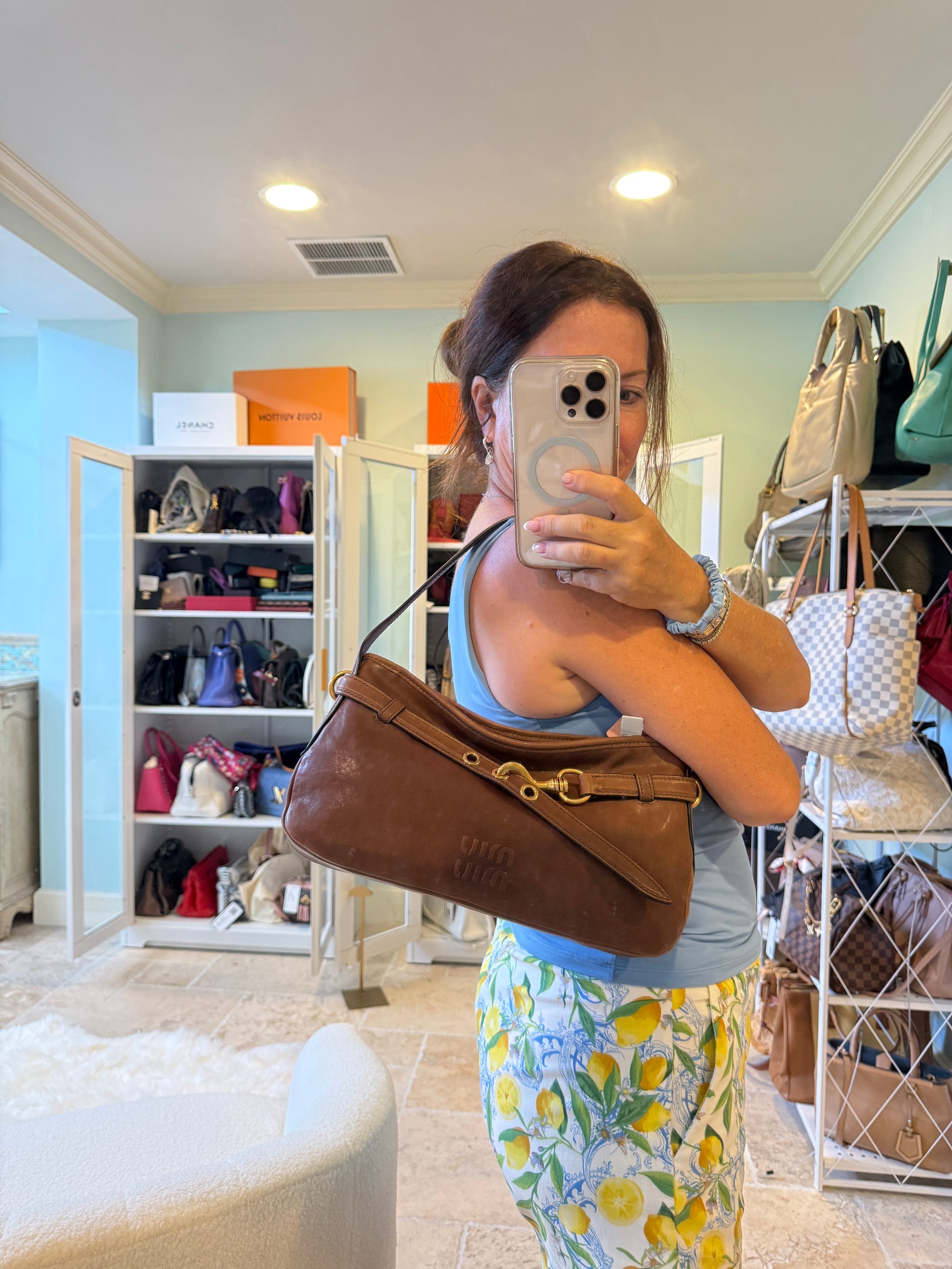 Miu Miu brown shoulder bag brand new shown on womans shoulder