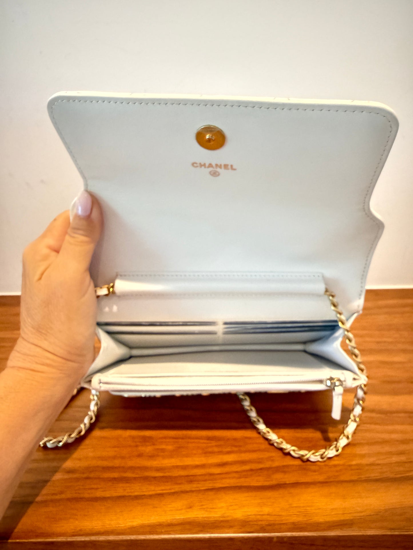Chanel wallet on chain view of interior with 16 card slots and zipper compartment