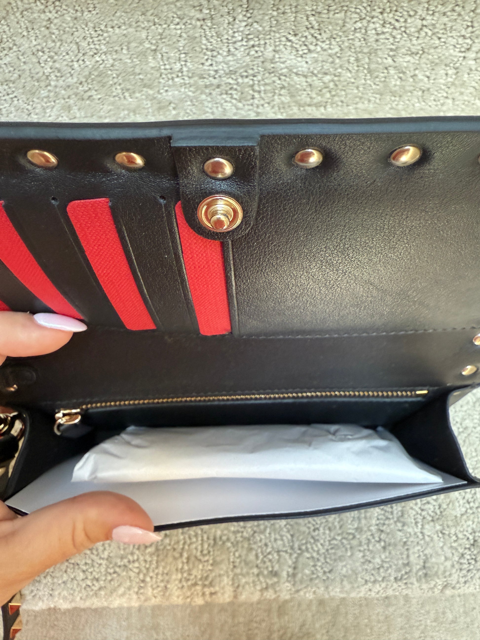 Valentino Ruckstud New Clutch with Wrist Strap showing interior which fits largest Iphone