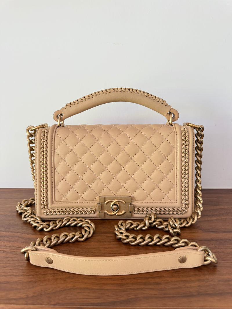 Chanel boy bag size medium with top handle in beige leather with gold hardware authentic preloved