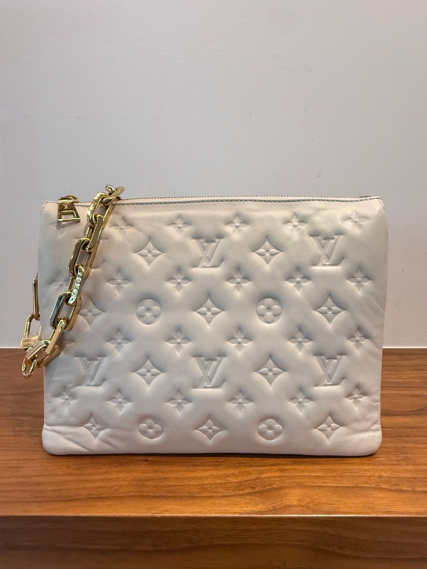 Louis Vuitton Coussin Bag PM White opposite side of handbag shown very clean
