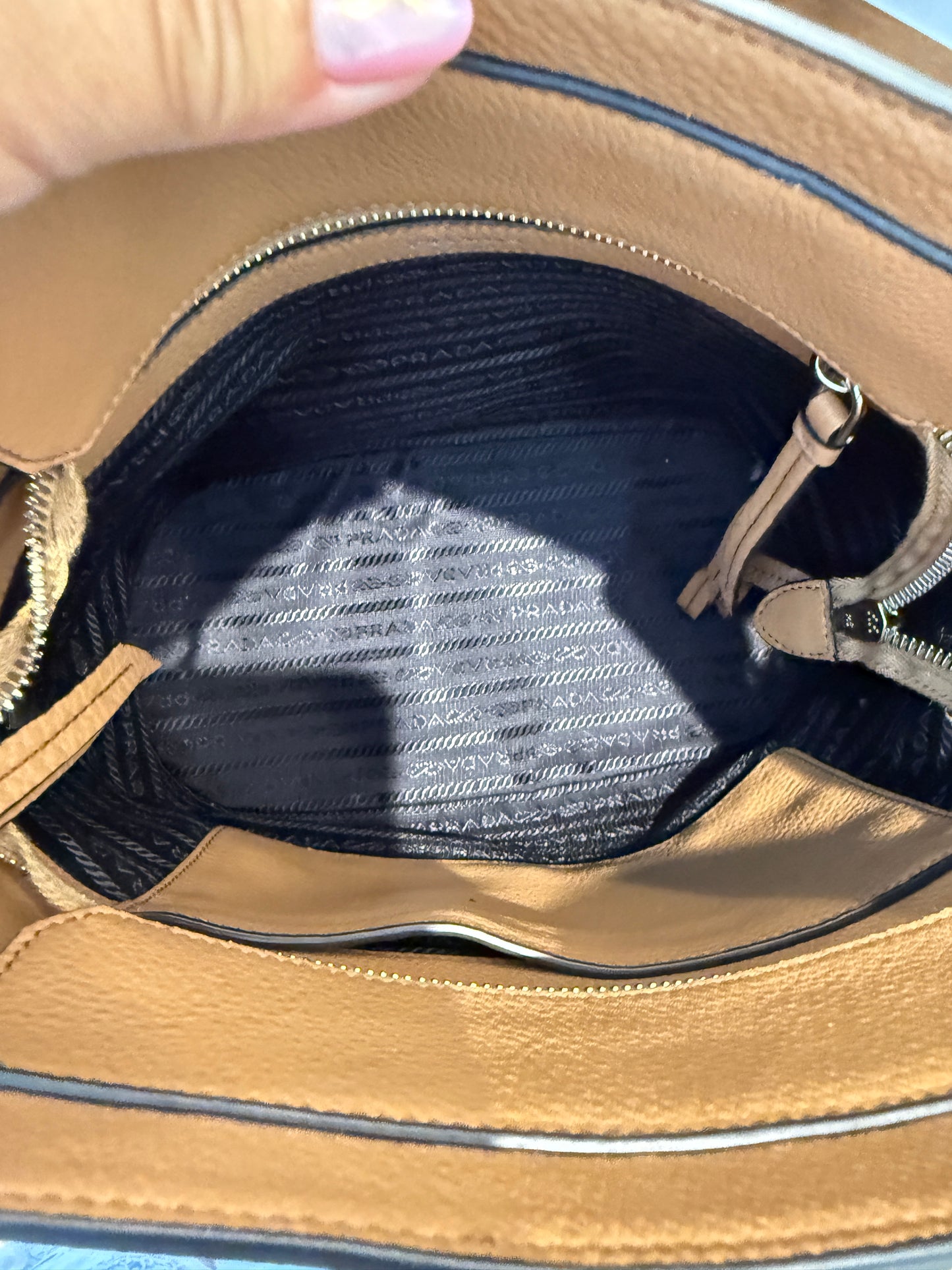 Interior view of photo vitello crossbody bucket bag super clean
