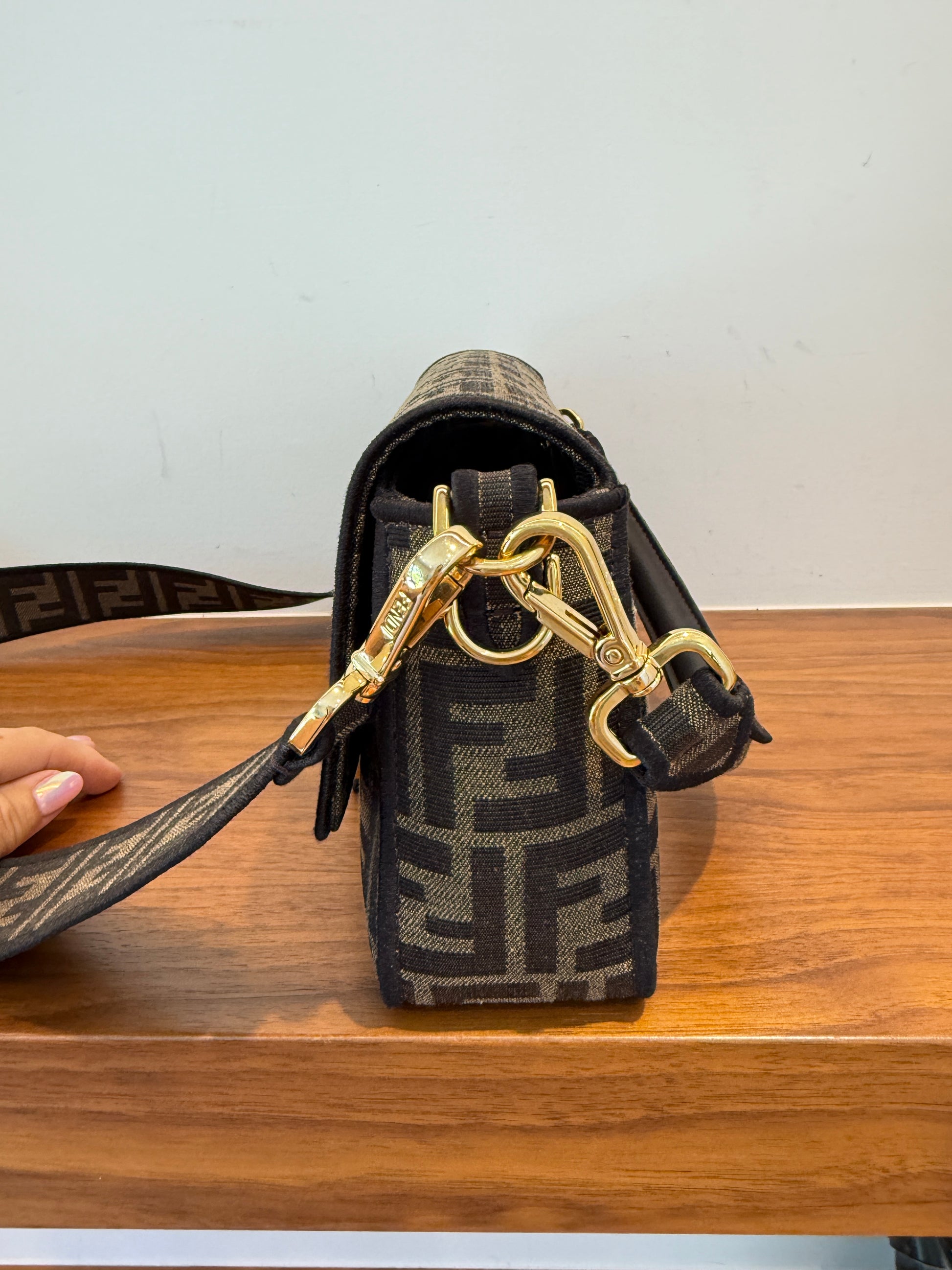 Fendi monogram baguette resale like new condition side view shown