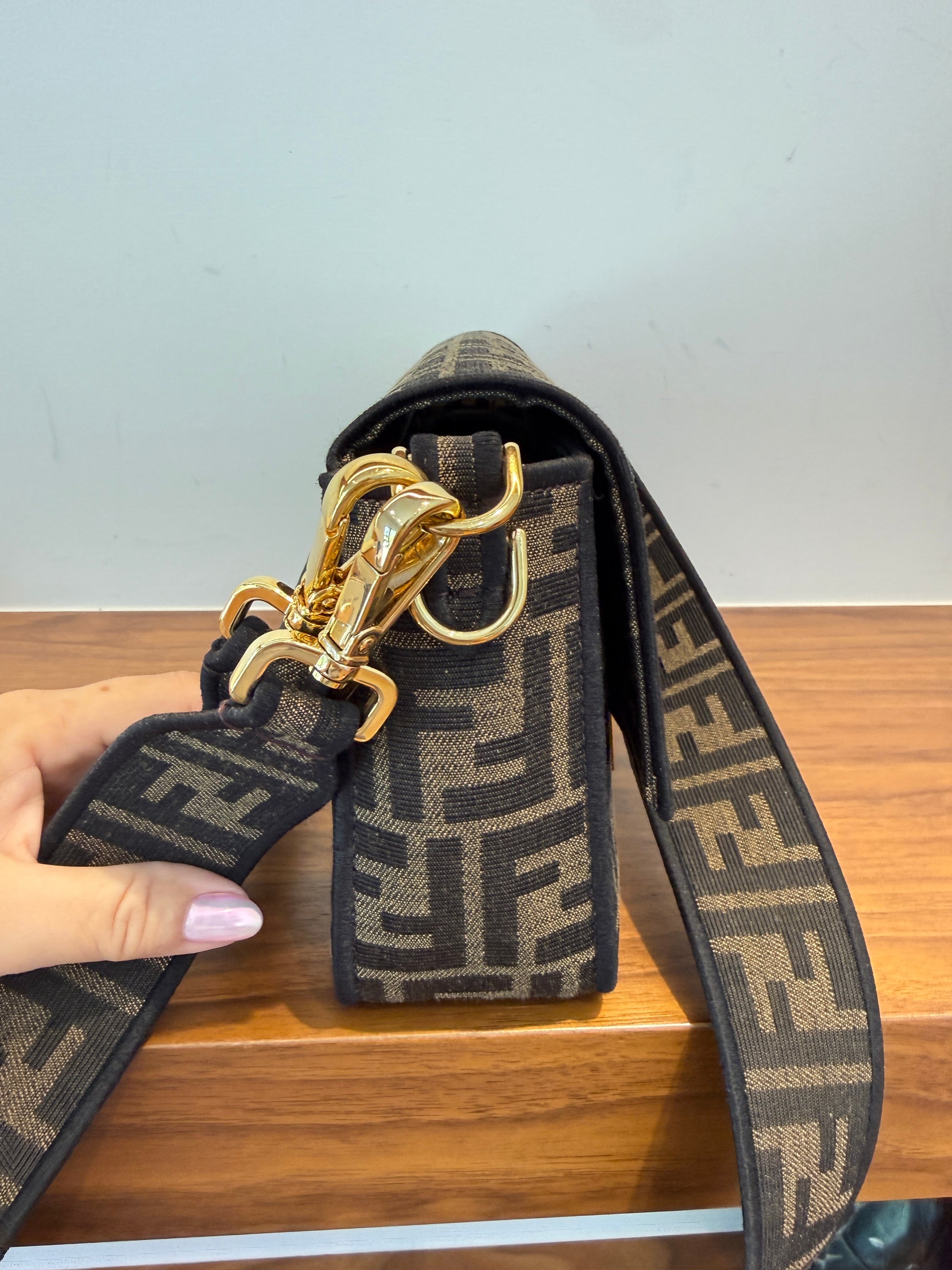 close up of other side view of fendi baguette consignmnet available