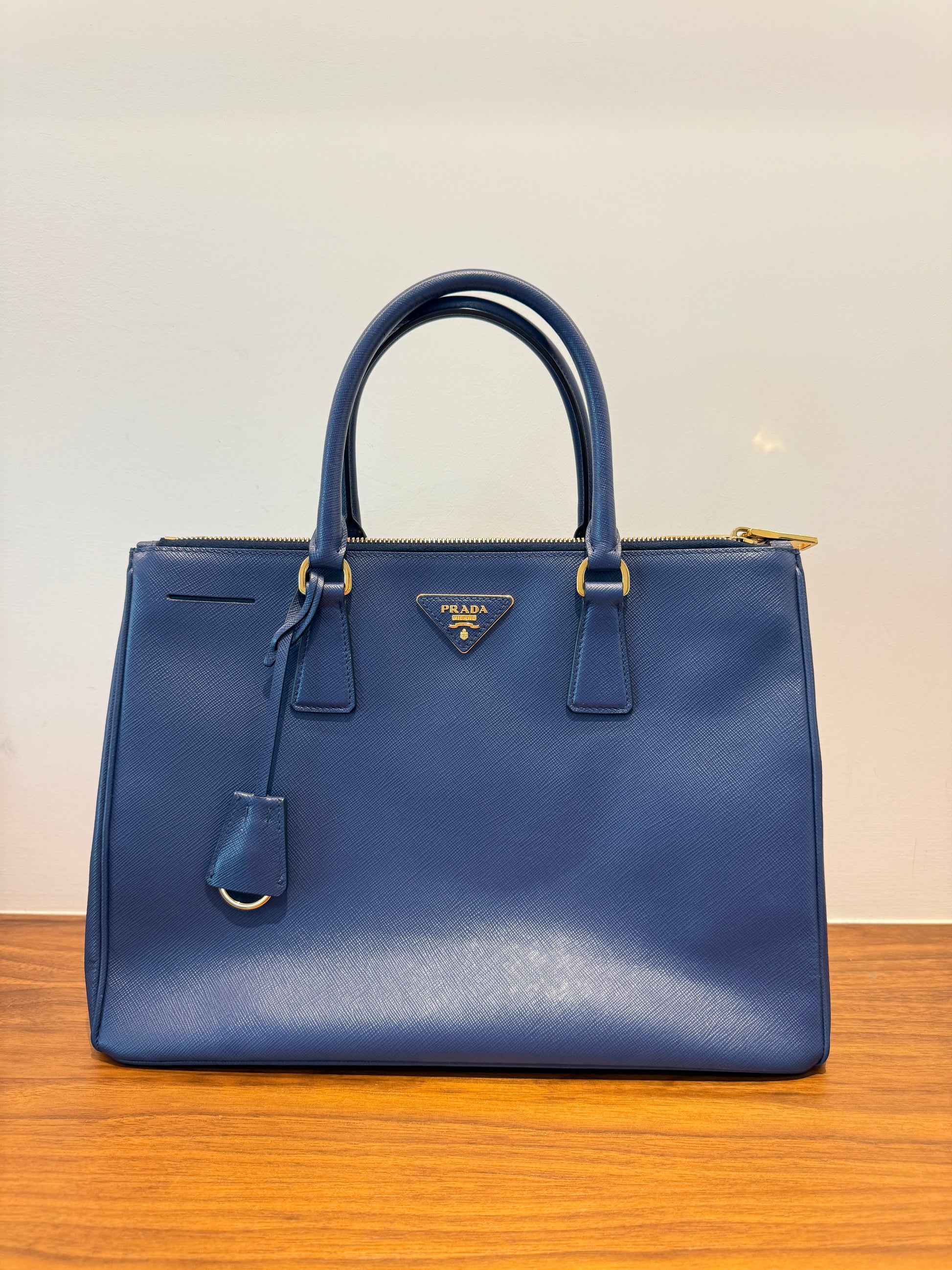 Prada galleria handbag authentic pre-owned in navy blue for sale from purseonalshopper