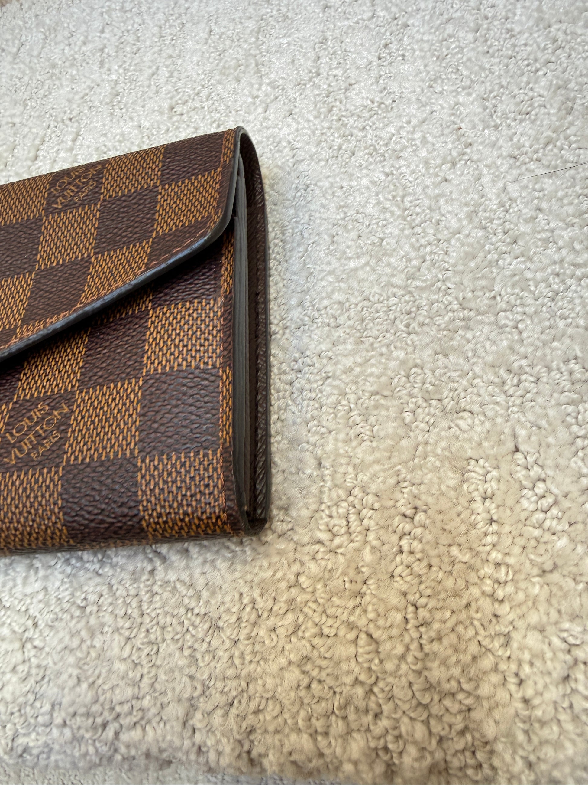 Louis Vuitton Sarah Wallet Damier Ebene showing excellent preowned condition