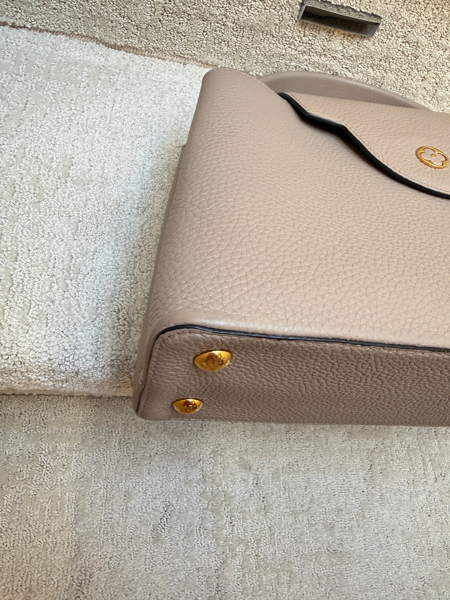 Louis Vuitton Taurillon Capucines PM in Galet or taupe