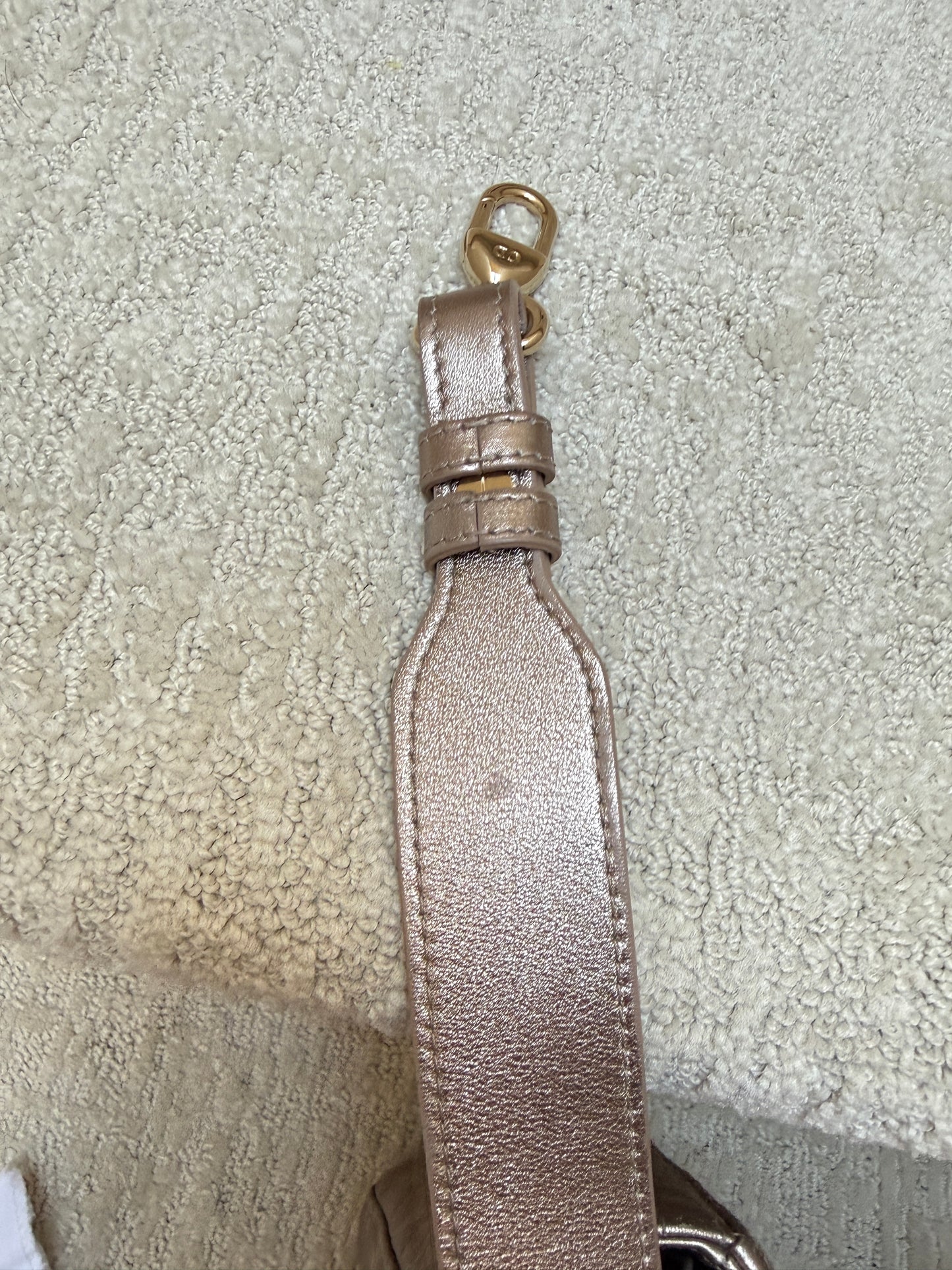 small mark on shoulder strap under side