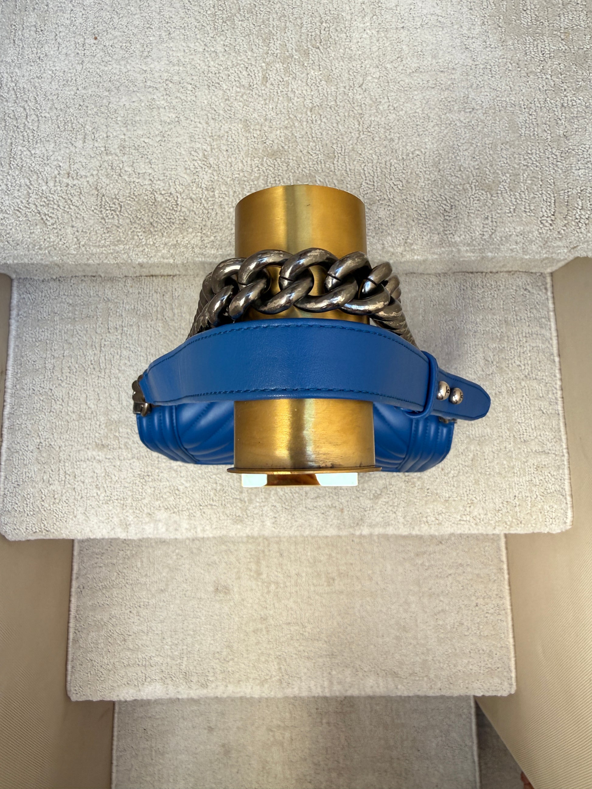 view of chain and soft shoulder strap on chanel medium boy bag preloved