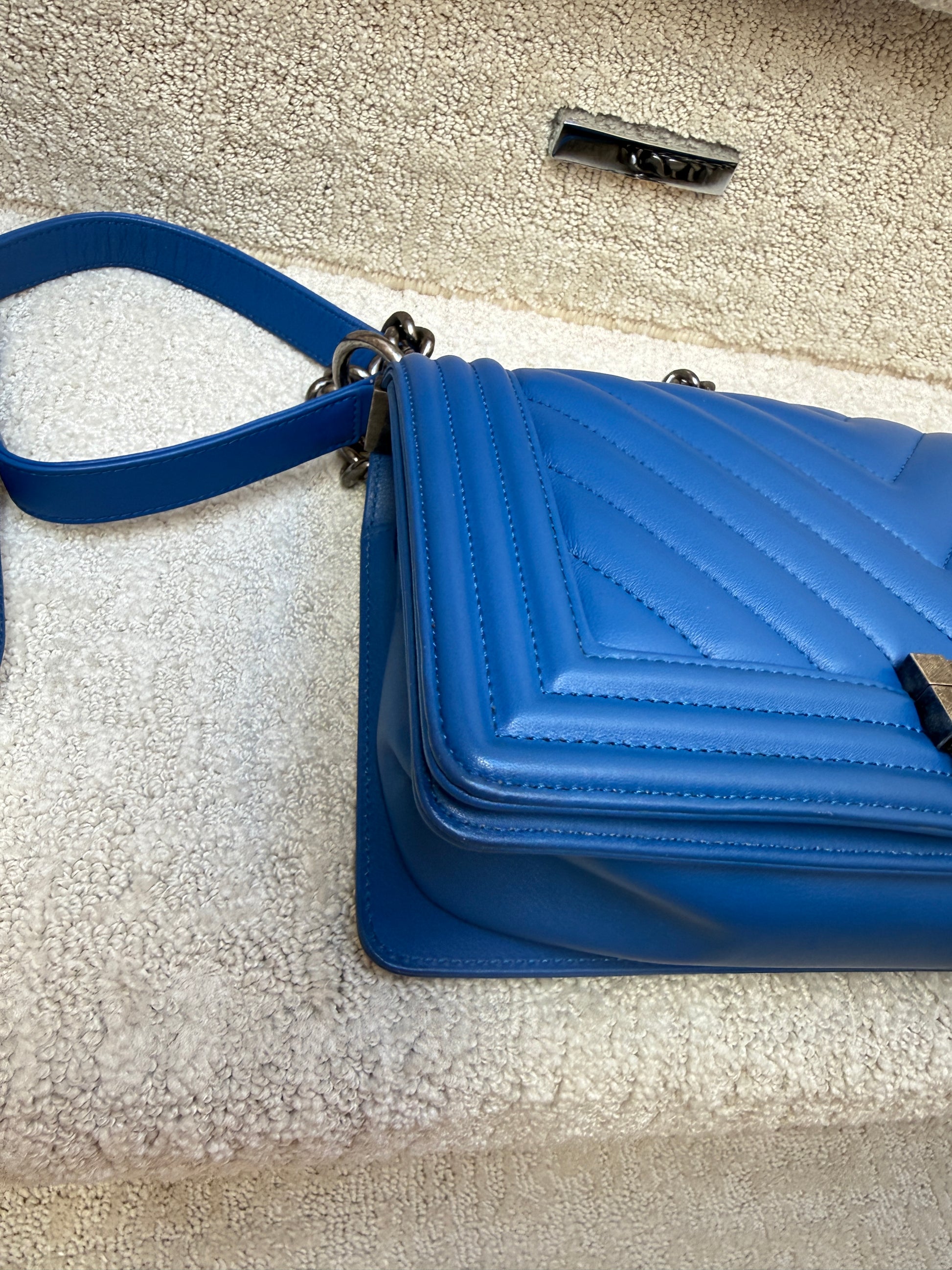 Chanel Blue quilted handbag close up of clean corner resale