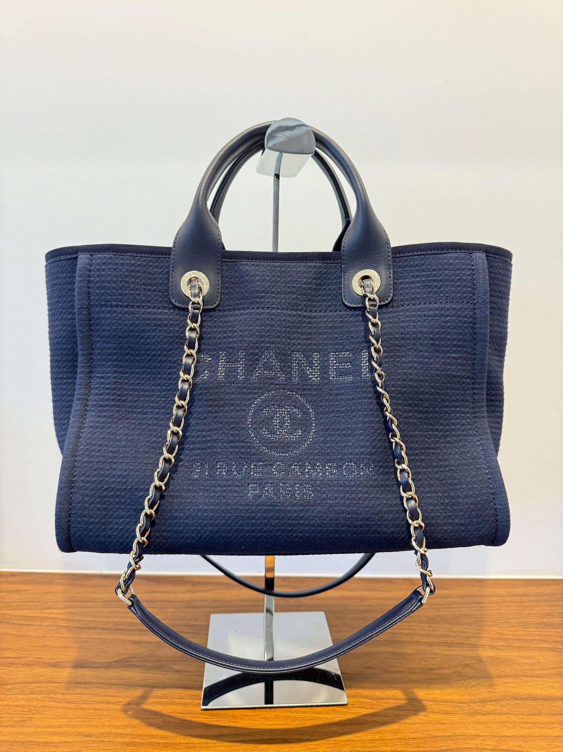 Chanel deauville tote in navy blue fabric with silver hardware authentic and pre-owned from purseonalshopper