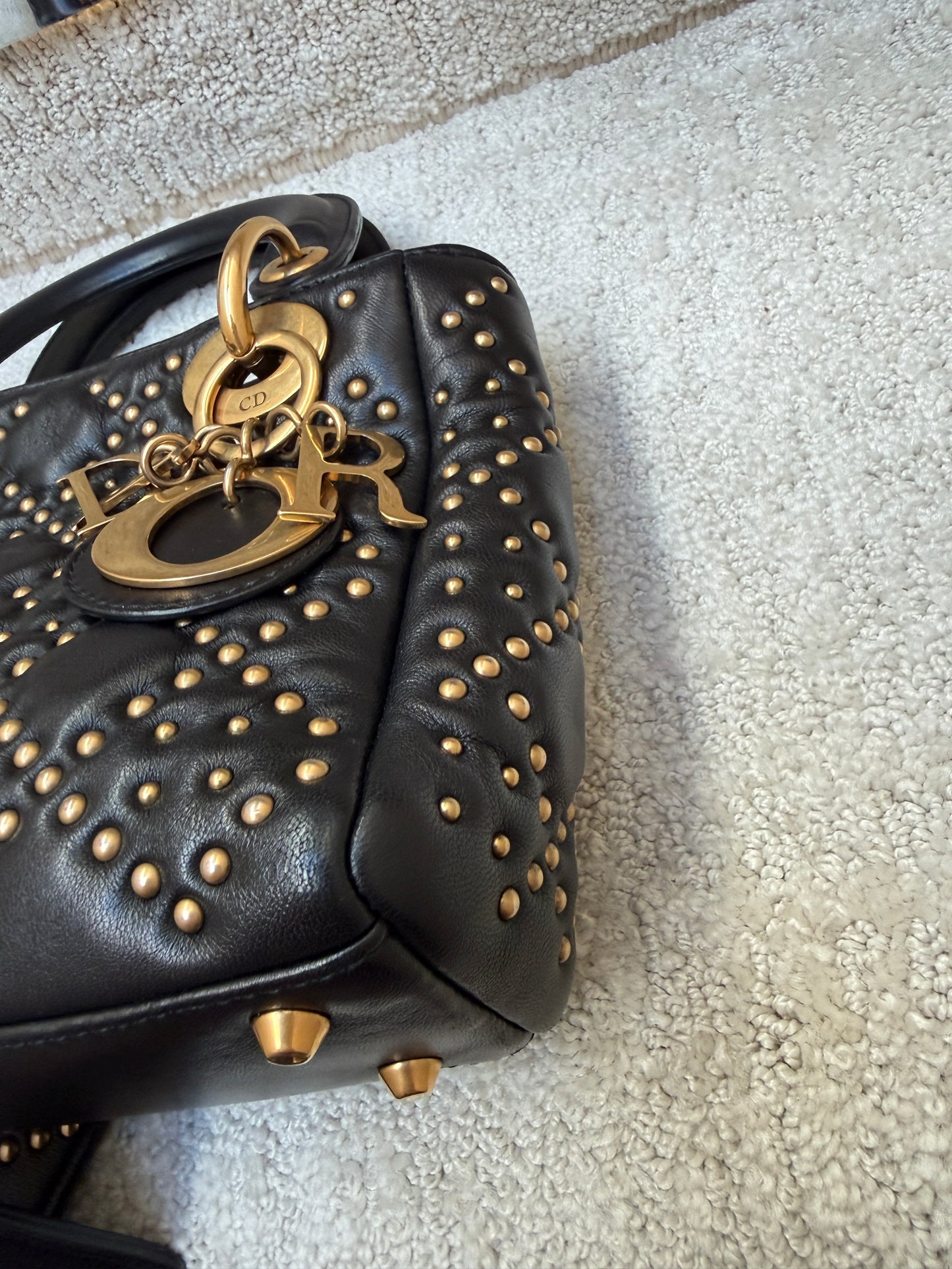 Christian Dior Mini Lady Dior gold stud detail View of corner