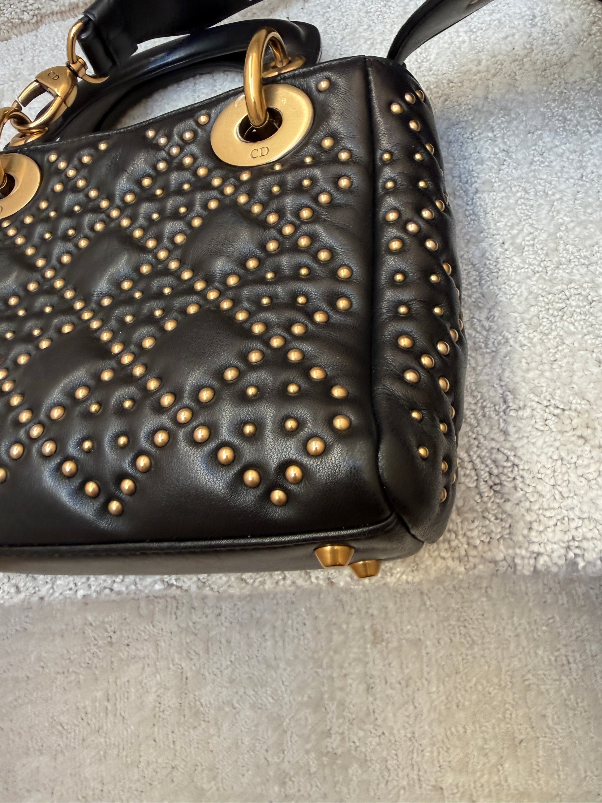 Christian Dior Mini Lady Dior gold stud detail With closeup view of corner