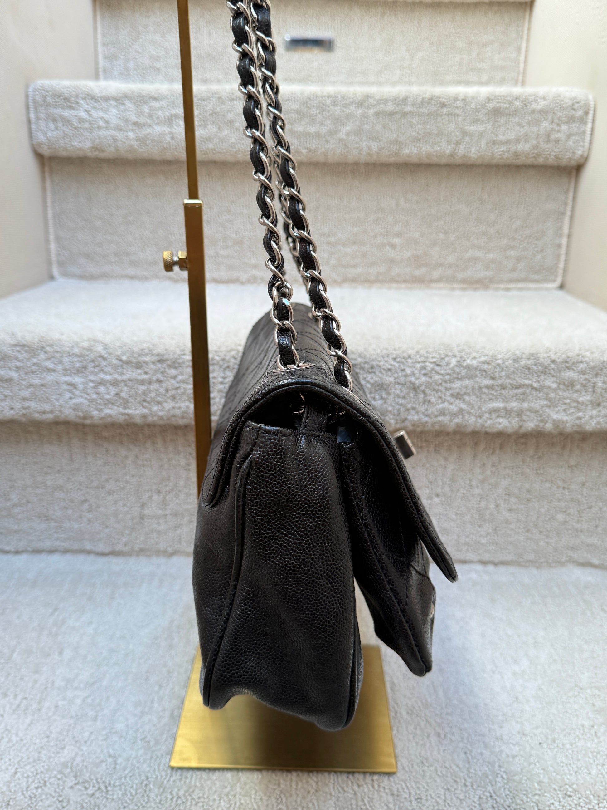 chanel 2.55 reissue in black view of other side