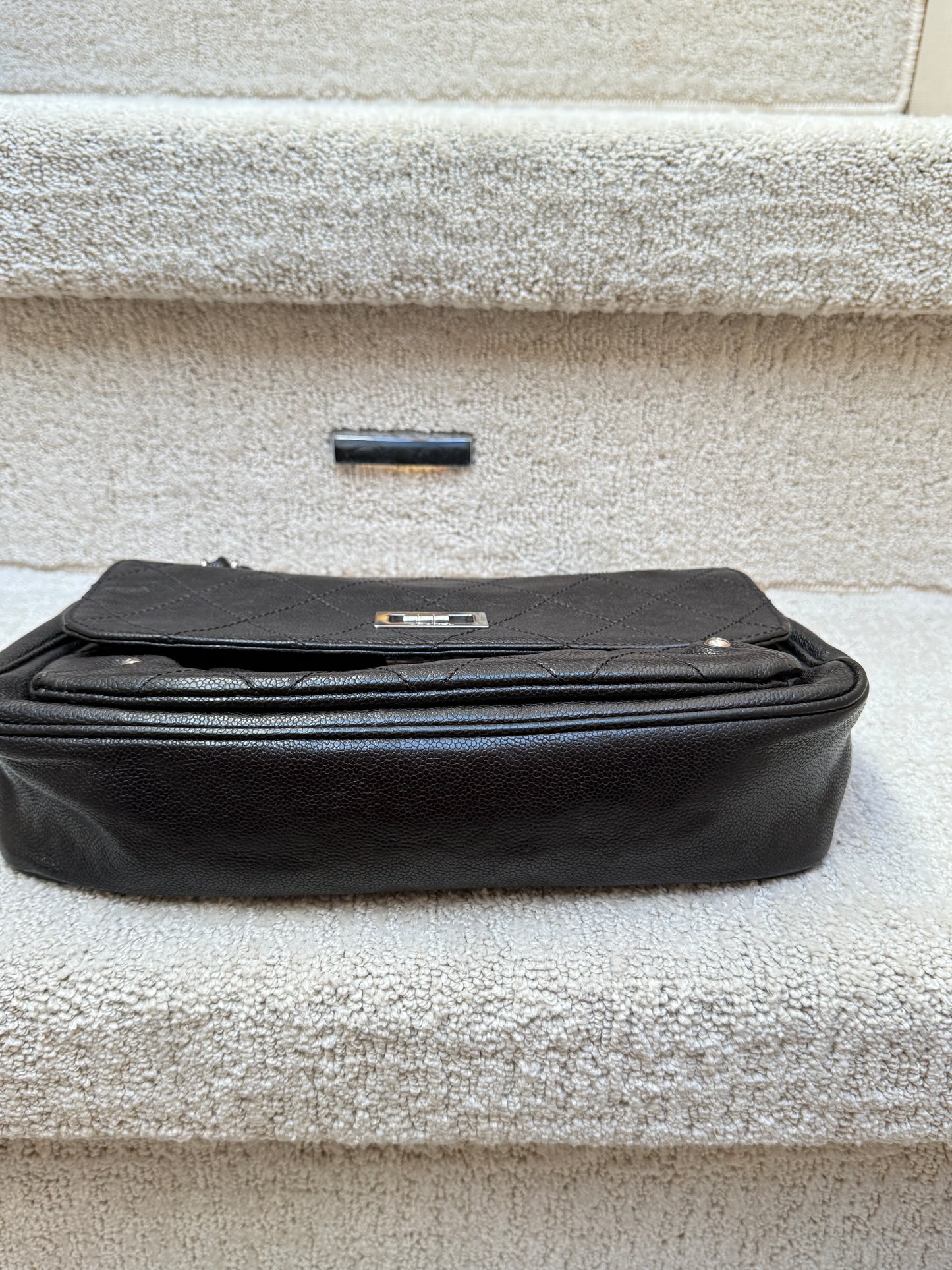 Chanel 2.55 reissue caviar flap back view of bottom of handbag preloved