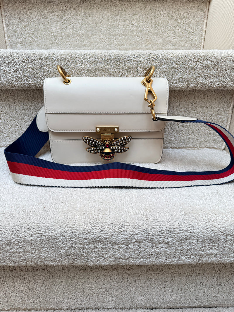 Gucci Queen Margaret Handbag in White calfskin leather and gold hardware with bee closure and striped we strap full view