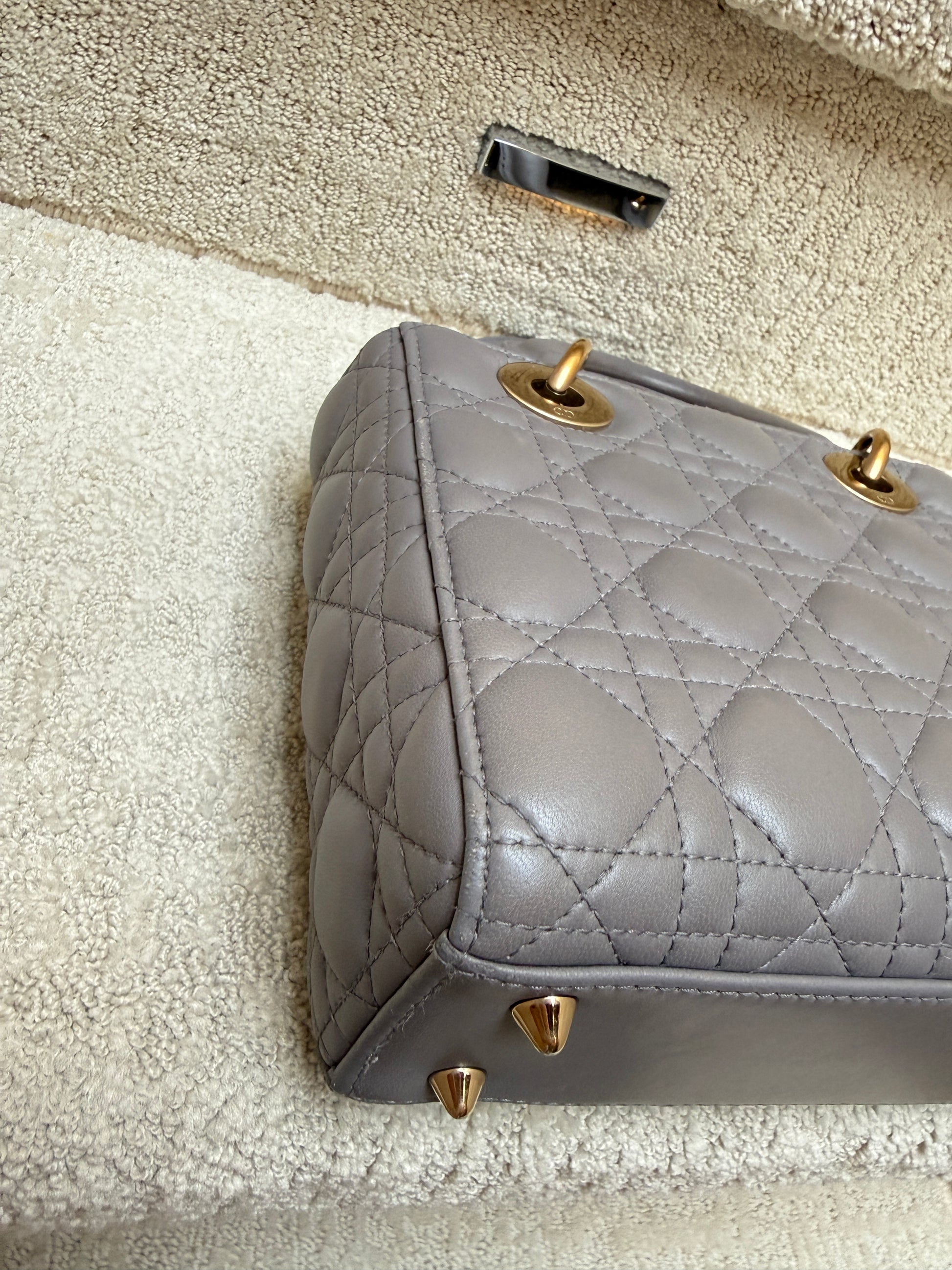 christian dior lady dior grey cannage handbag close-up of fourth clean corner