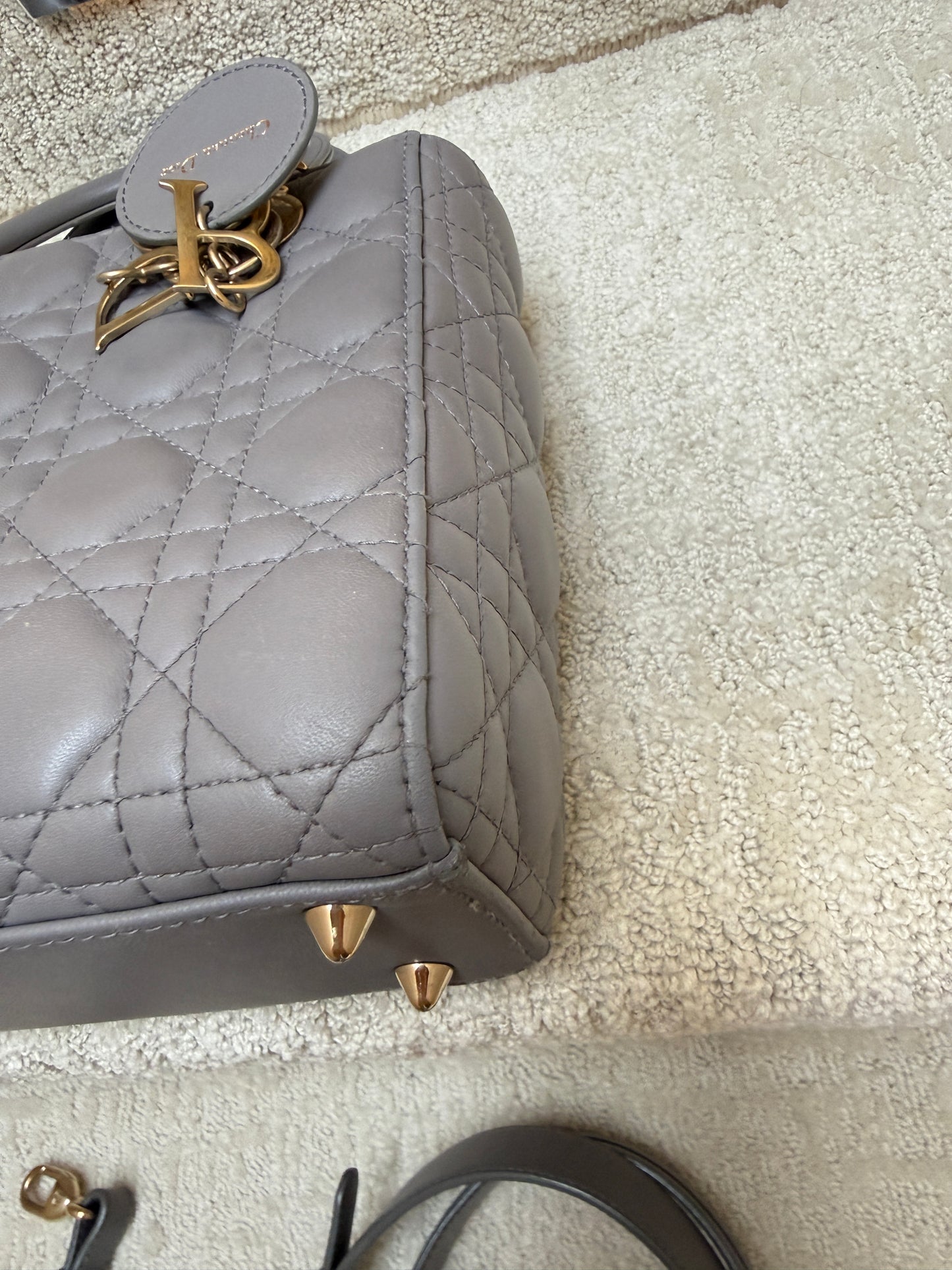 christian dior lady dior handbag close up of third corner excellent preloved condition