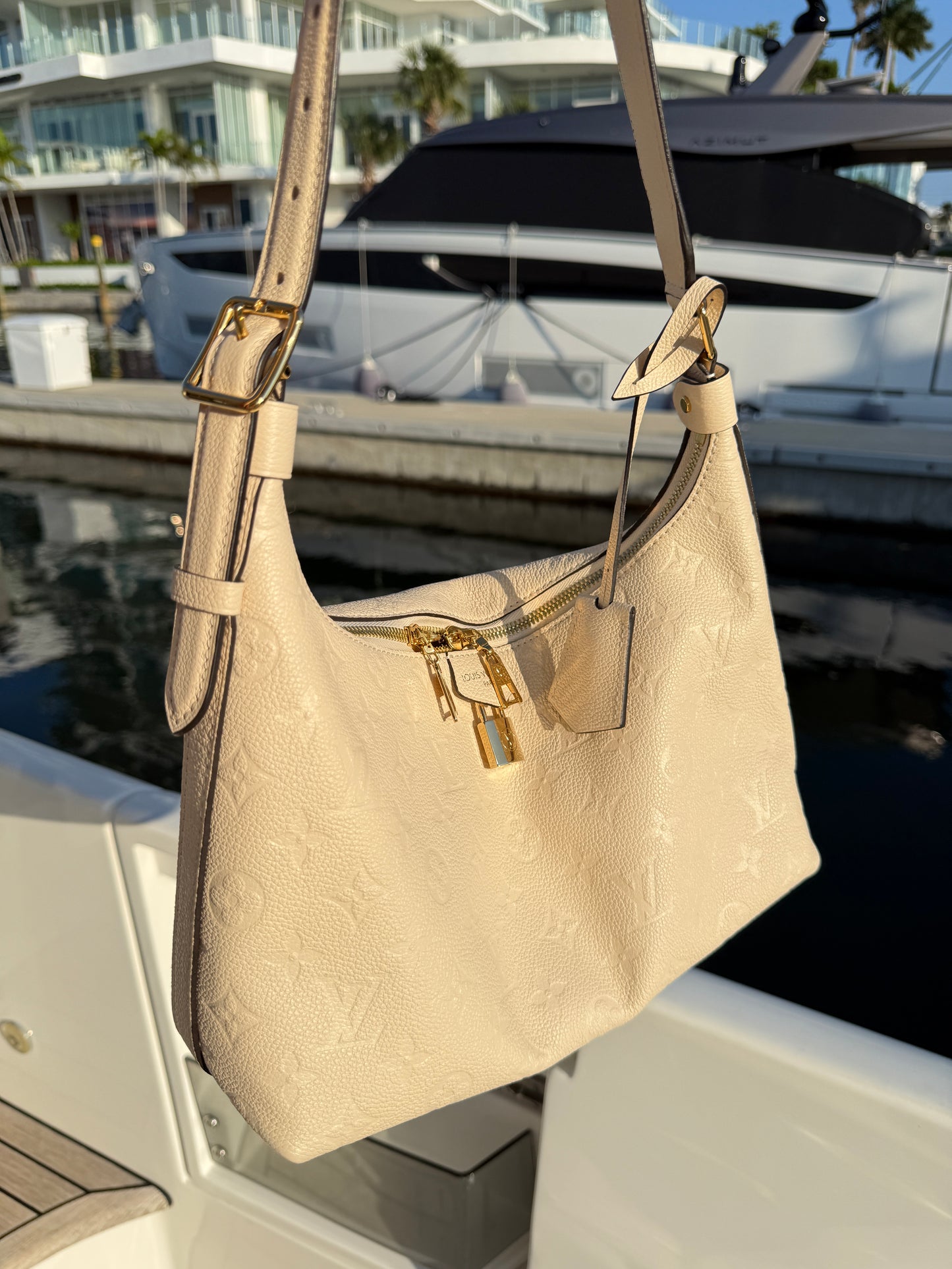 Louis Vuitton Empreinte Monogram Sac Sport in Cream Pre-Owned