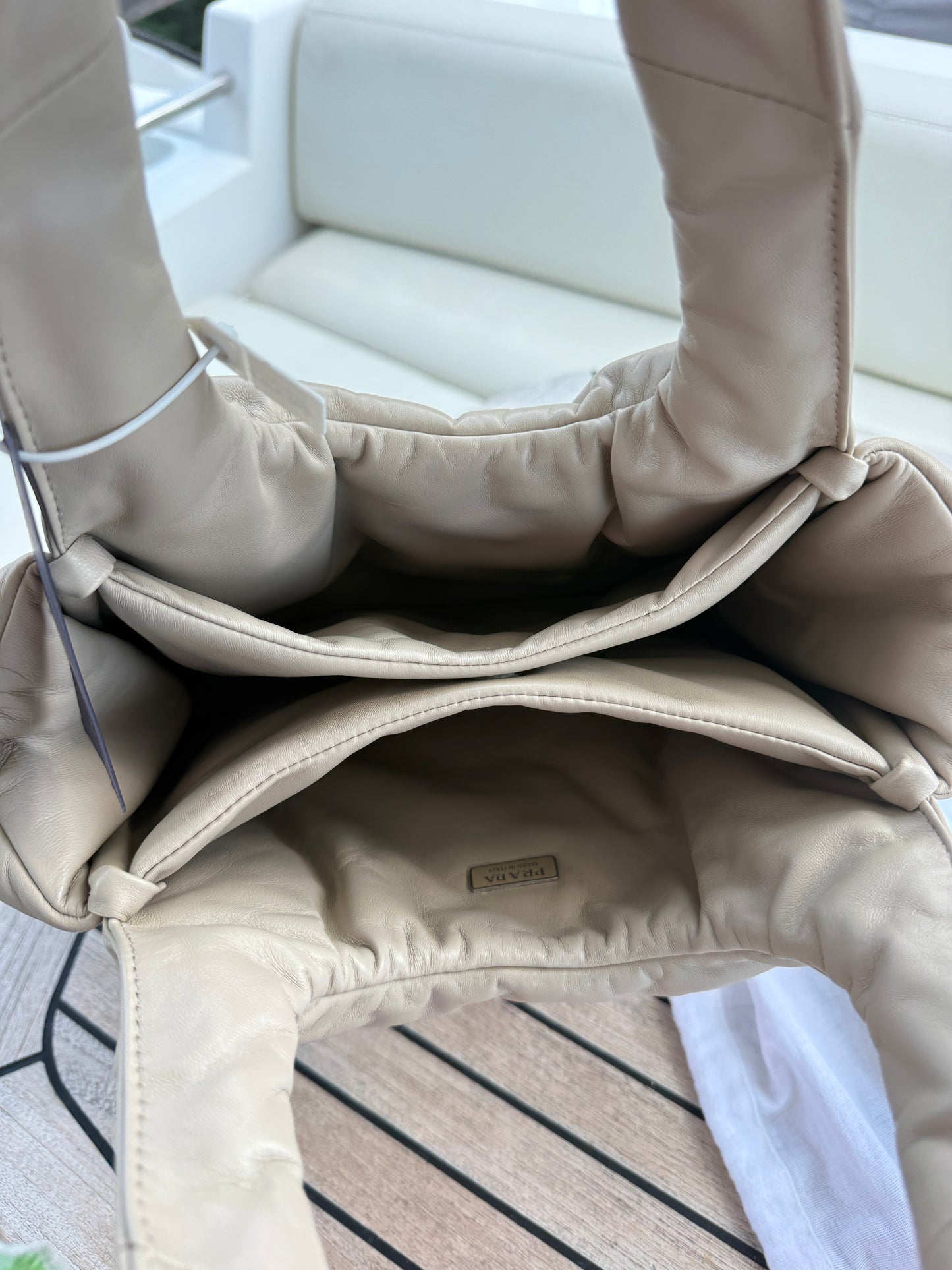 Prada Medium Padded Soft Nappa Leather Bag is Beige