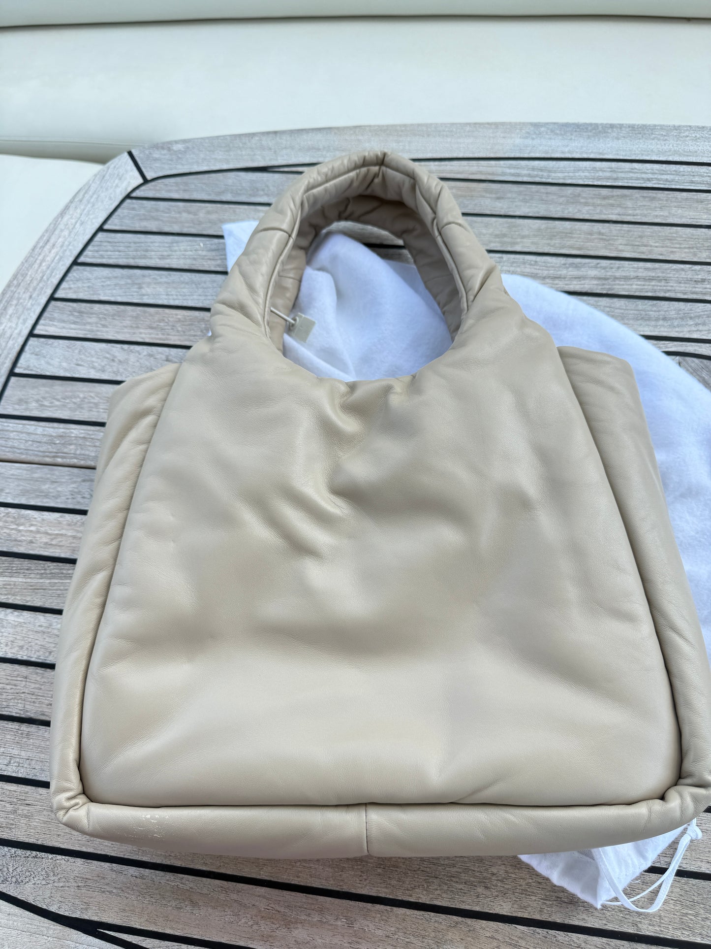 Prada Medium Padded Soft Nappa Leather Bag is Beige