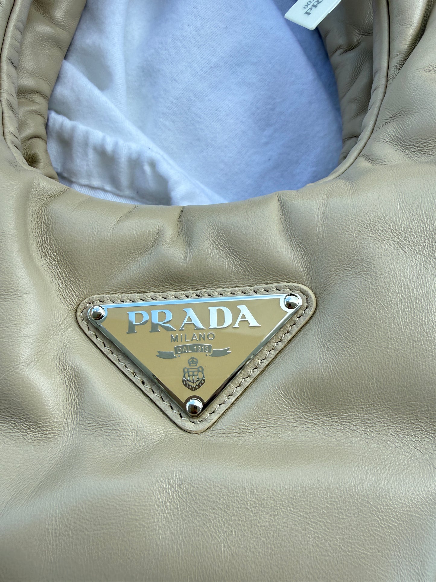 Prada Medium Padded Soft Nappa Leather Bag is Beige