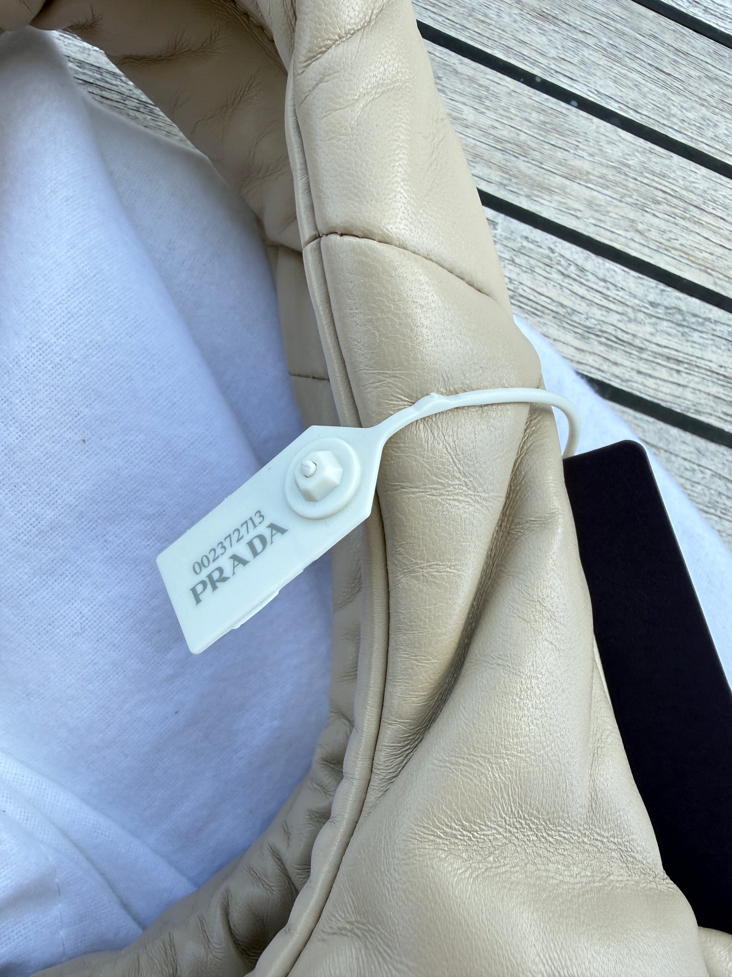 Prada Medium Padded Soft Nappa Leather Bag is Beige
