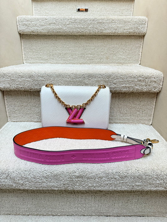 Authenticated Louis Vuitton Twist MM handbag White Epi Leather with Pink and orange accents in excellent condition luxury designer shoulder bag on resale from Purseonal shopper 