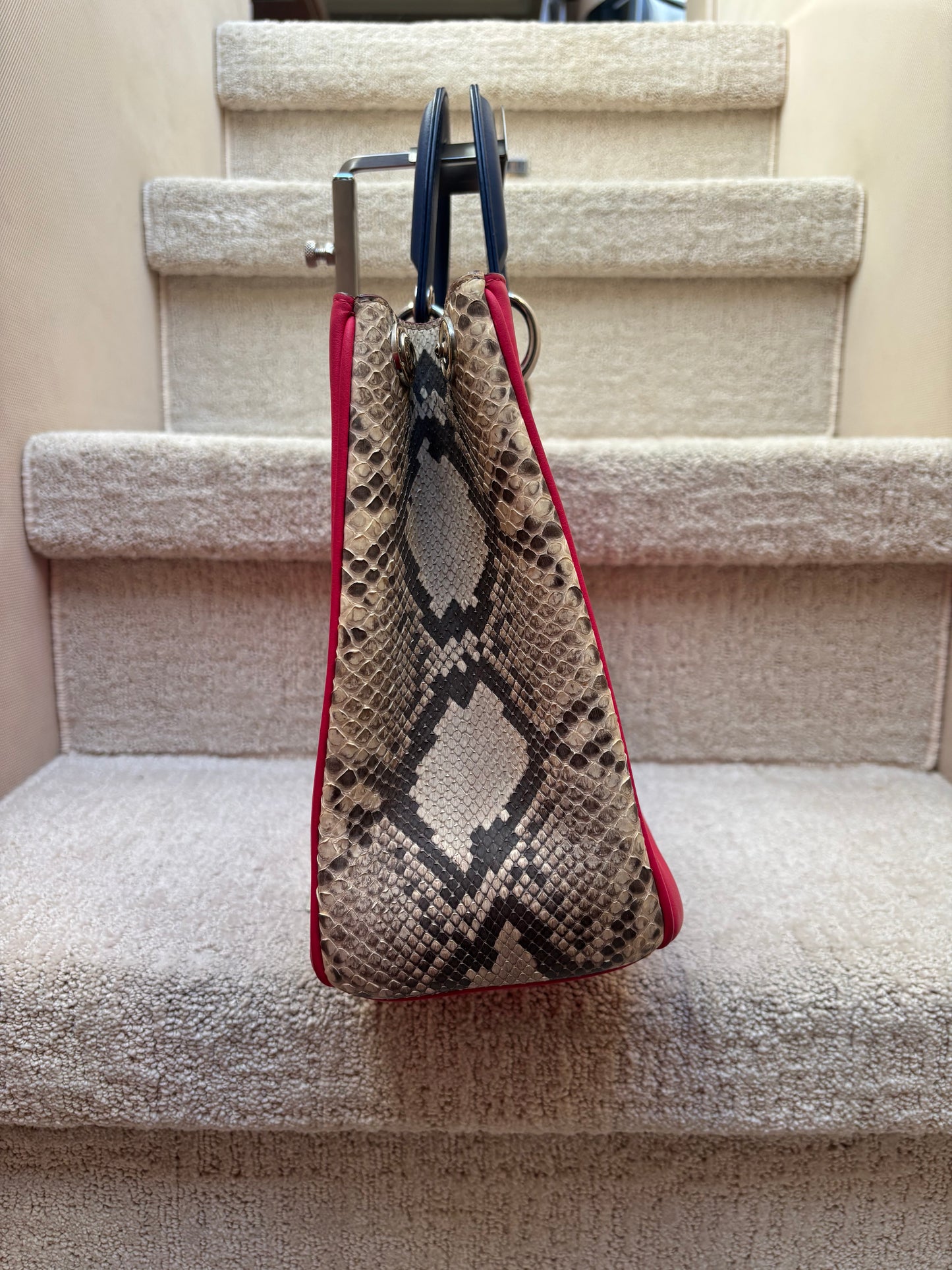 Side view of dior handbag sale with genuine python sides reseller