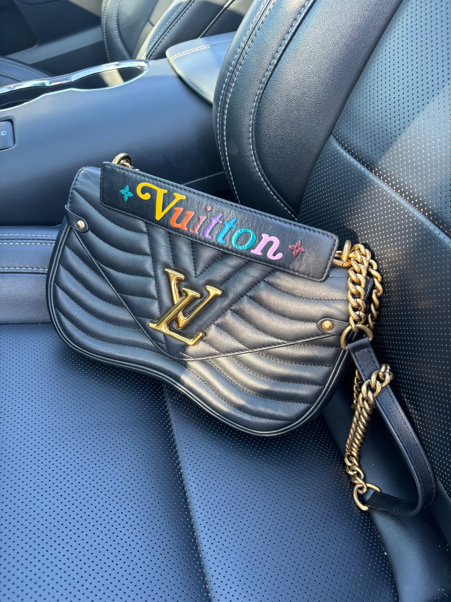 Lousi vuitton new wave handbag in black authentic preowned in black leather