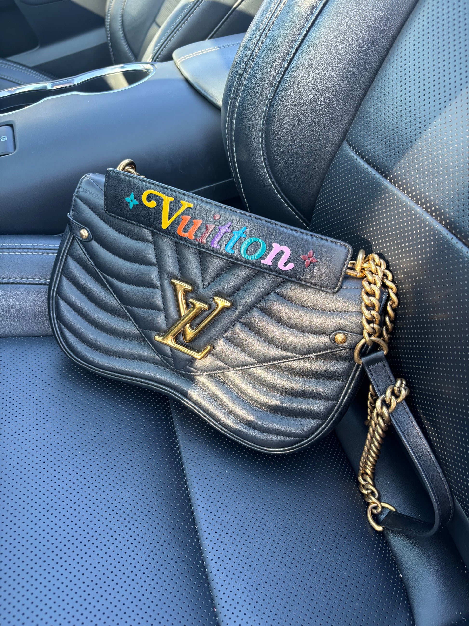 Lousi vuitton new wave handbag in black authentic preowned in black leather