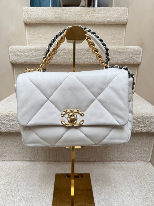Front view of authenticated Chanel 19 small white leather curated from purseonalshopper