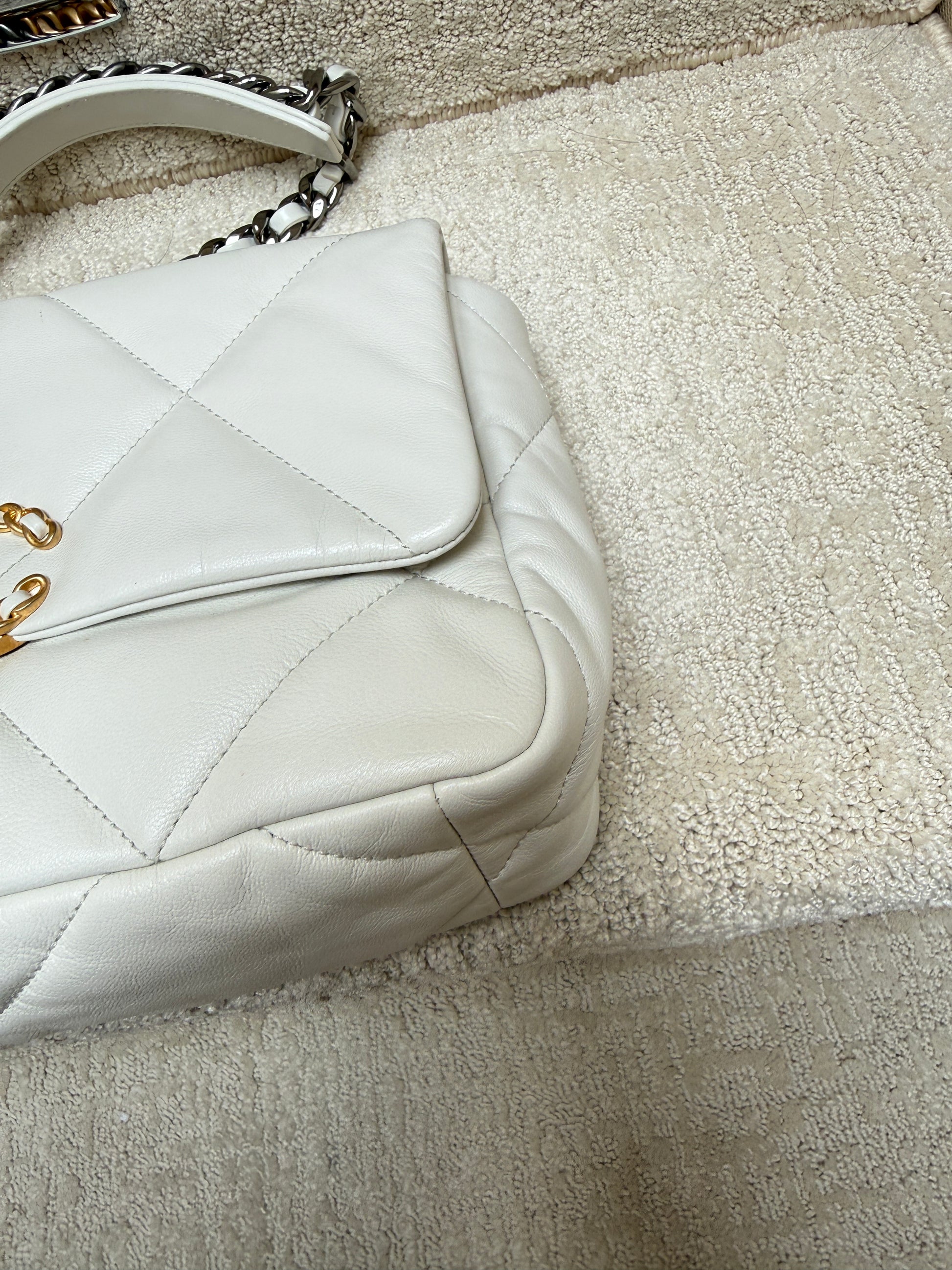 
Close up of chanel 19 white corners shown clean